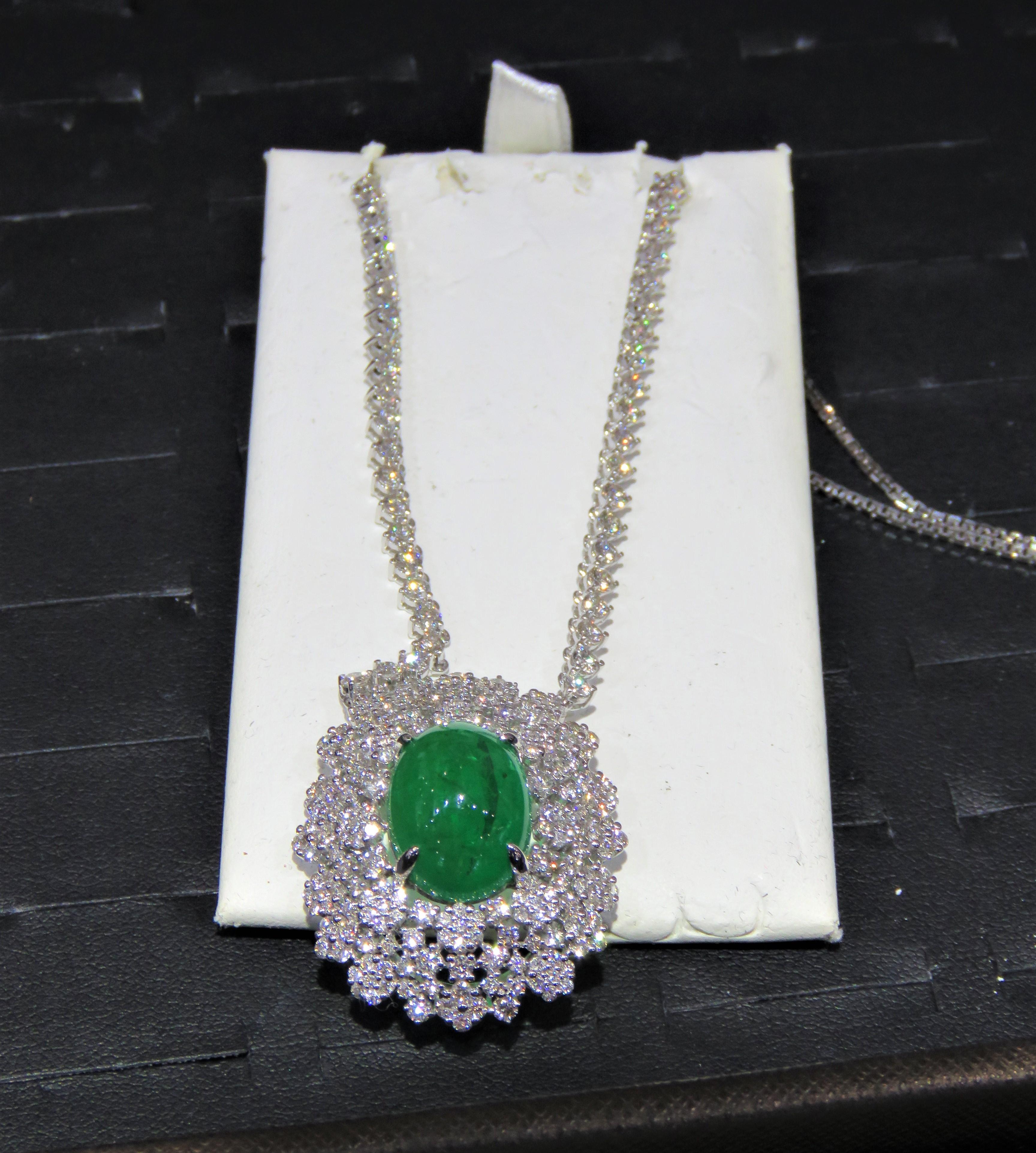 The Following Item we are offering is this Rare Important Radiant 18KT Gold Gorgeous and Sparkling Magnificent Fancy Emerald and Diamond Necklace. Necklace features approx 16CTS of a Beautiful Fancy Cabachon Green Emerald and Glittering Diamonds!!!