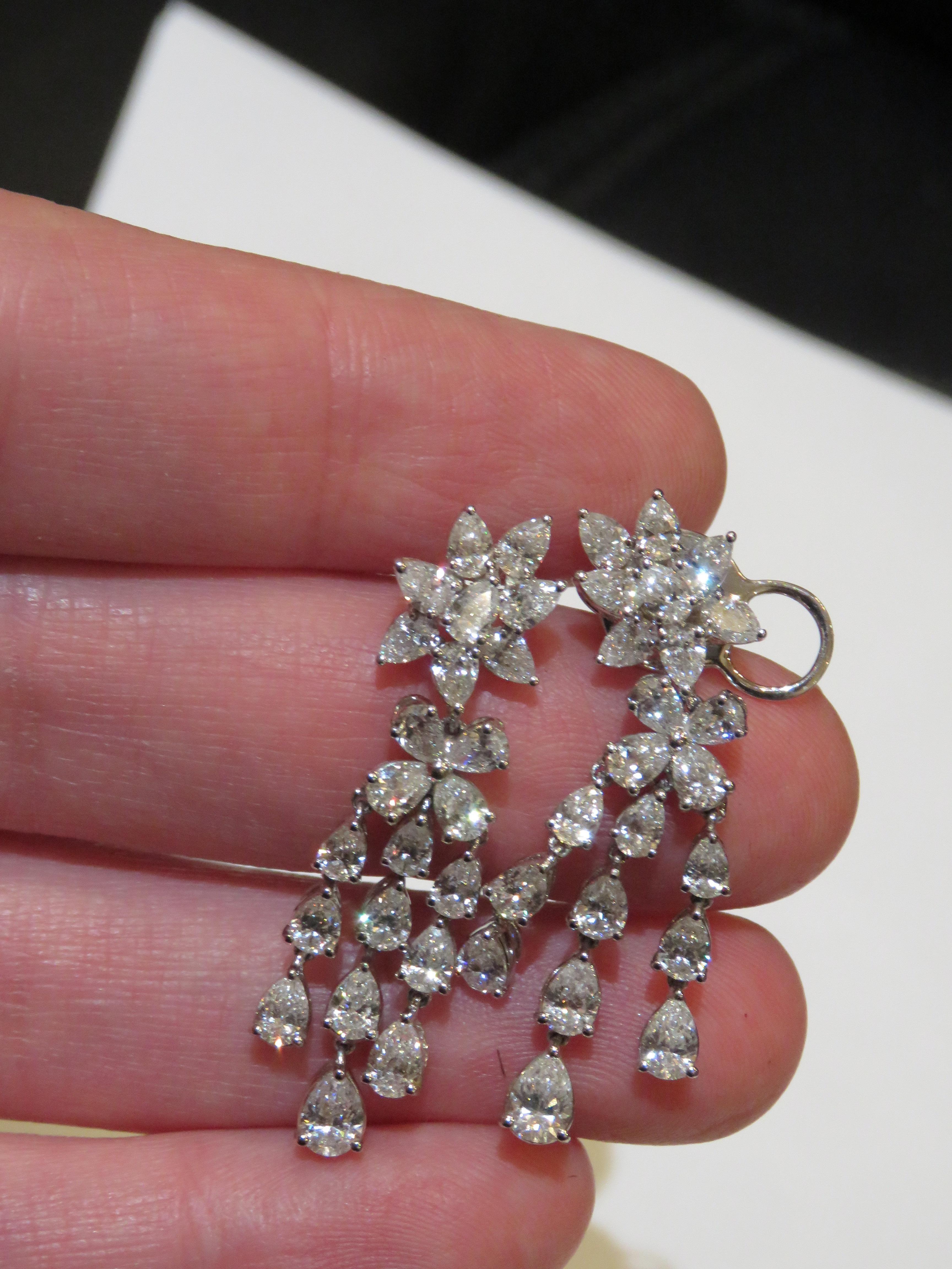 The Following Item we are offering are these Extremely Rare Beautiful 18KT Gold Fine Large Fancy White Diamond Dangle Earrings. Each Earring features Gorgeous Magnificent Fine Quality E-F Color Diamonds. T.C.W. Approx 6CTS!!! The Diamonds are of