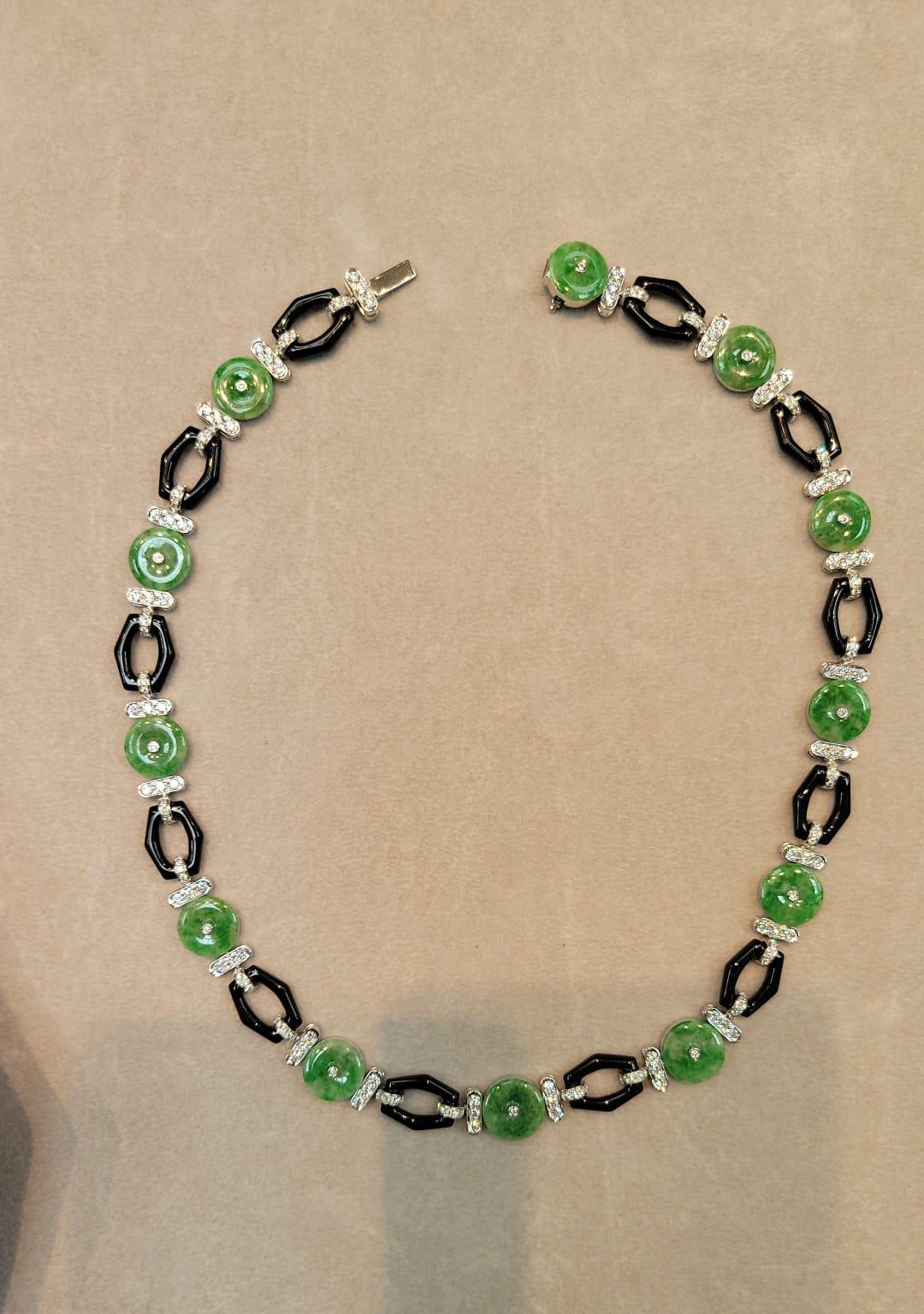The Following Item we are offering is a Rare Magnificent Radiant 18KT Gold Large Rare Gorgeous Fancy Burmese Jade Diamond Necklace. Necklace is comprised of Beautiful Rare Burmese Jade and Glittering Diamonds and Black Onyx. T.C.W. Approx 225CTS of