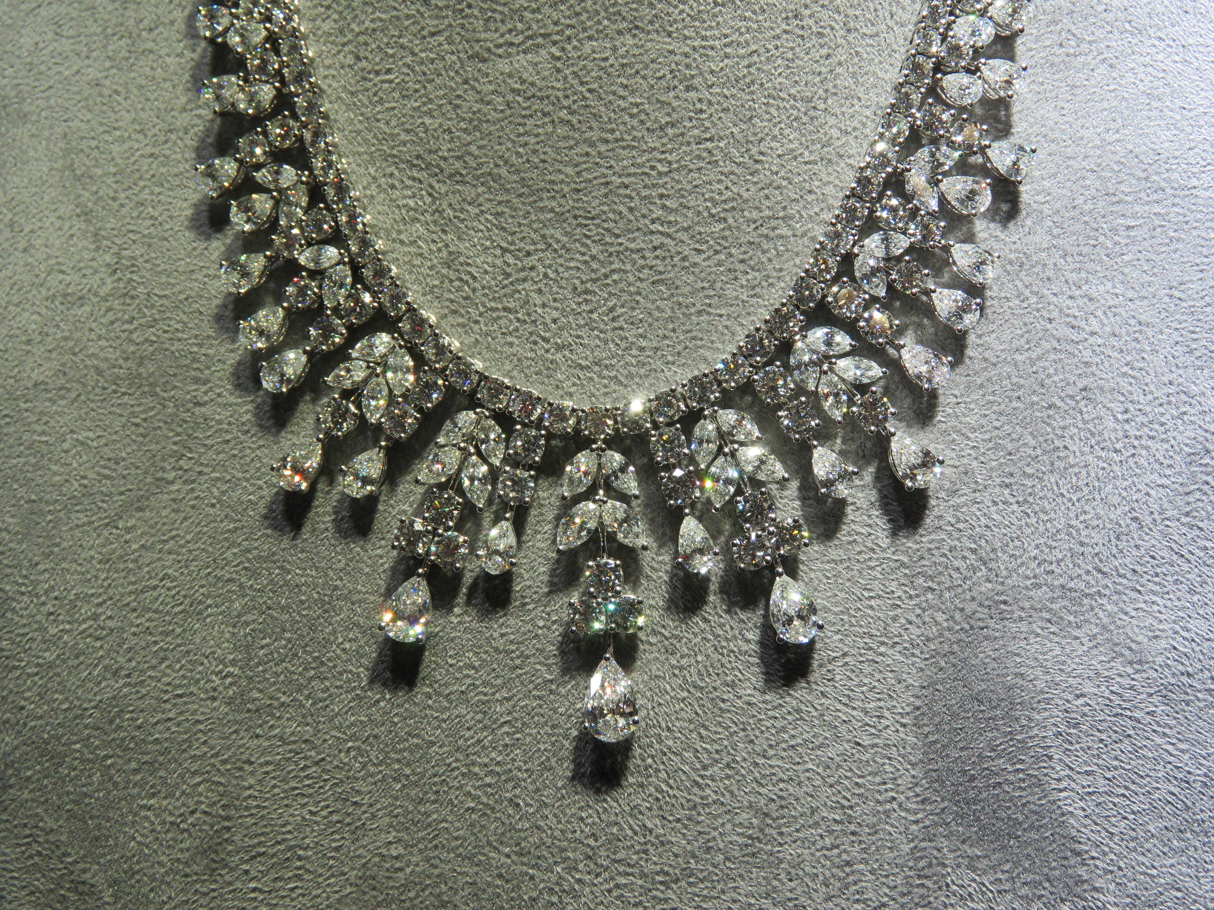 The Following Item we are offering is a Rare Important Gorgeous 18KT White Gold Winston Style Glistening GIA CERTIFIED Fancy Diamond Elaborate Strand Necklace!!!! This Necklace is Outstanding Multi Pear Shaped Glittering Diamond Necklace with 3