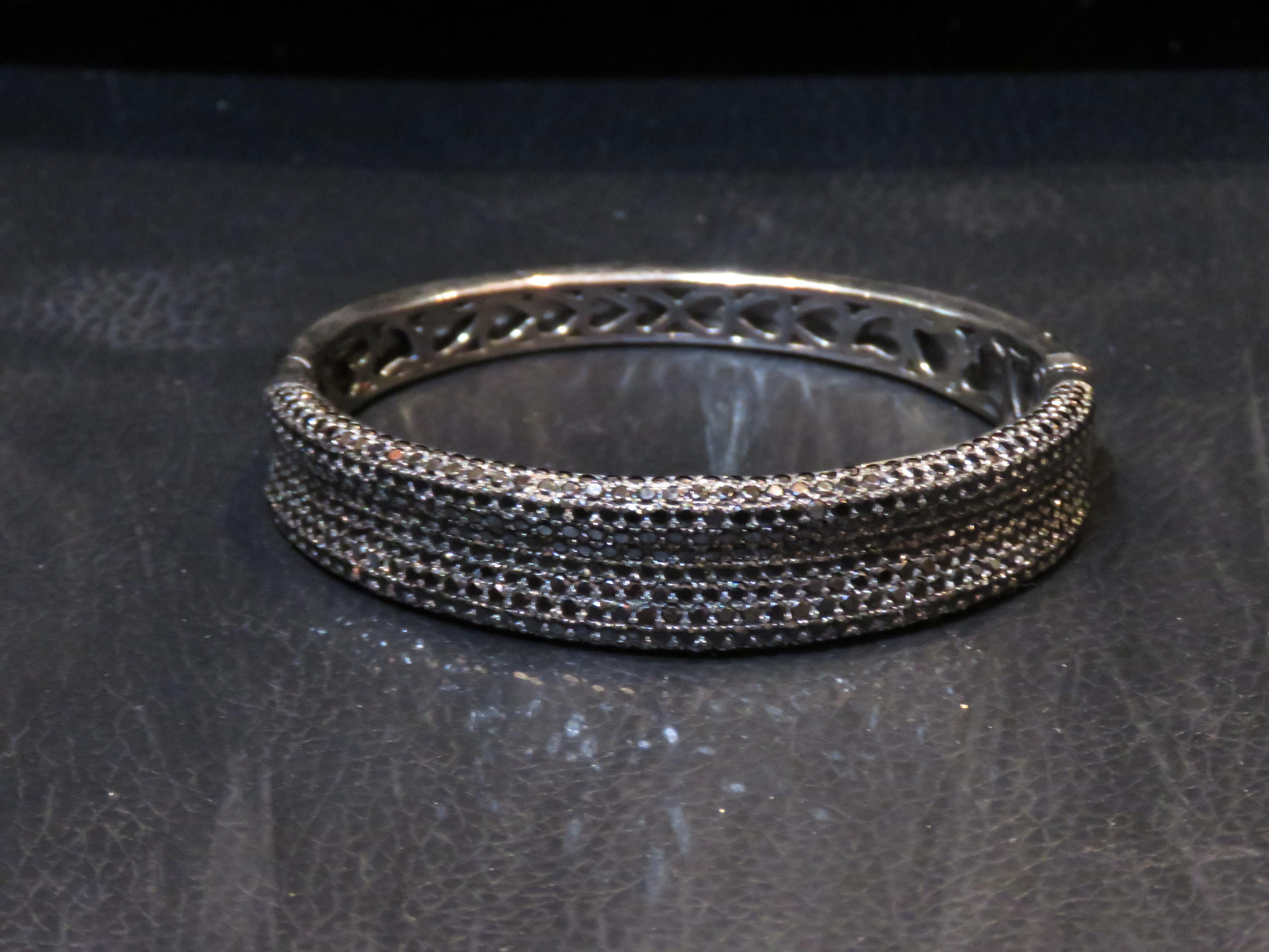 The Following Item we are offering is this IMPORTANT RARE GENUINE BLACK SPINEL BRACELET BANGLE CUFF APPROX 12 CTS!!! This Piece was Originally Priced at $4,000.00. An Absolute Brilliant and Radiant Piece of Jewelry!!! Don't Miss It Before It