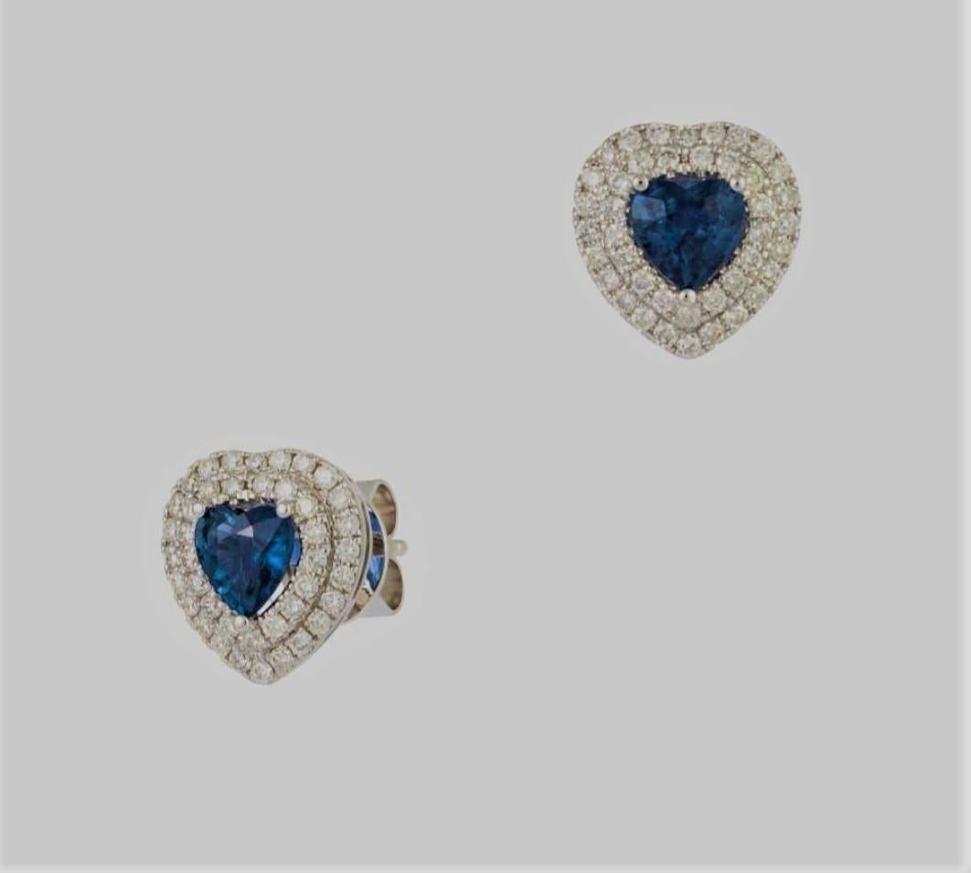The Following Item we are offering is this Beautiful Rare Important Gold Large Glittering Blue Sapphire and Diamond Heart Stud Earrings. These Magnificent Earrings are comprised of over 2CTS of Magnificent Rare Gorgeous Fancy Glittering Heart Shaped