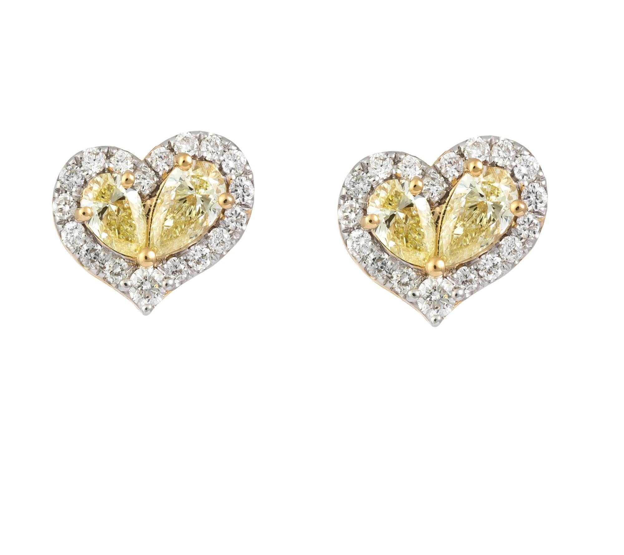 Il seguente articolo che offriamo è questo raro e importante orecchino in oro 18KT, splendido e scintillante, con diamanti gialli e diamanti a cuore. Gli orecchini contengono circa 1 carato di splendidi diamanti gialli circondati da diamanti