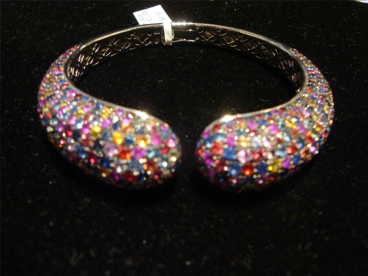 El siguiente artículo que ofrecemos es esta magnífica pulsera de plata de ley con forma de brazalete en forma de arco iris multicolor. T.C.W. ¡¡¡MÁS DE 23CTS!!! Este Magnífico Brazalete es una Rara Pieza de Muestra que se vendía en selectos Hoteles