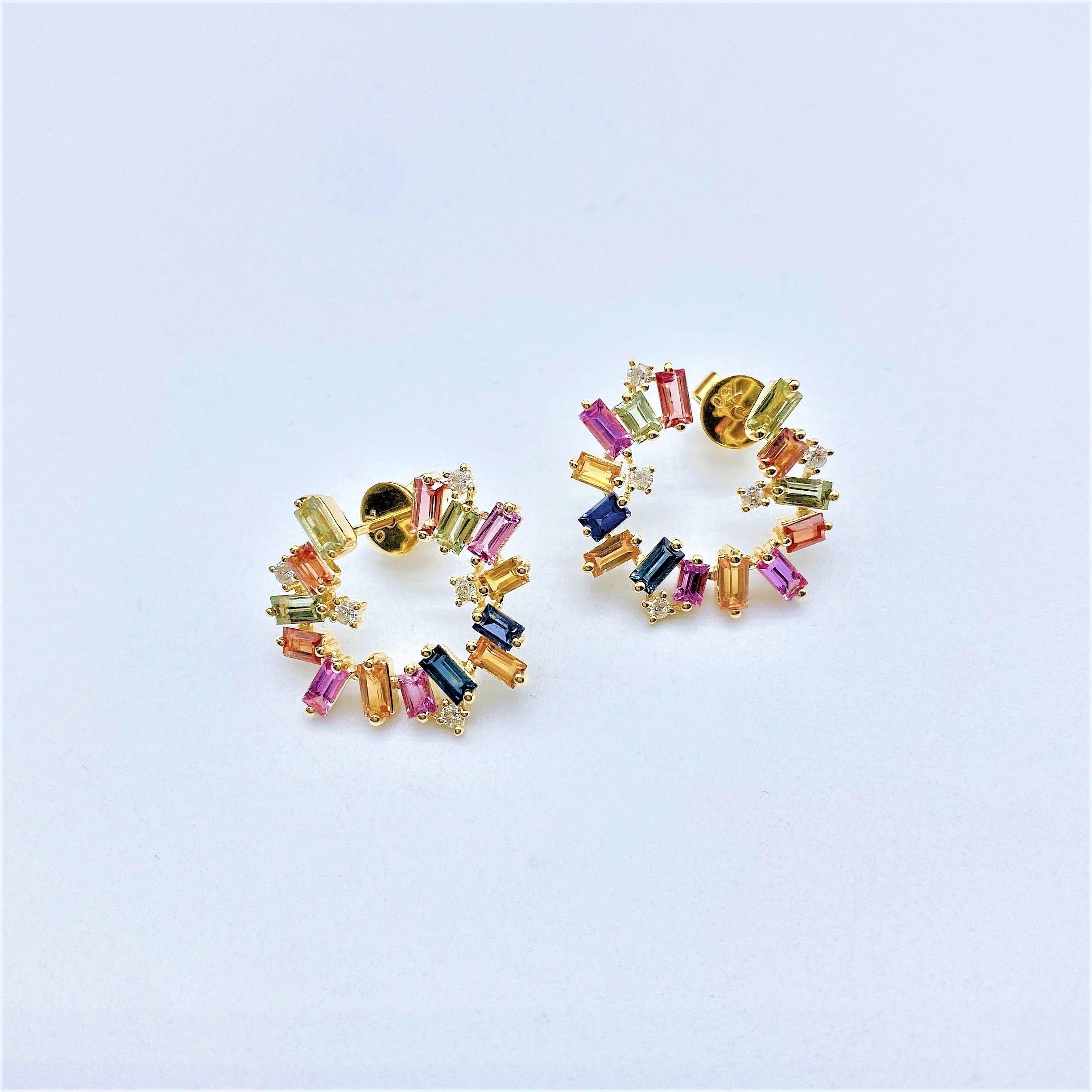 The Following Item we are offering is a Rare Important Radiant 18KT Gold Pair of Large Rare Gorgeous Multi Rainbow Sapphire and Diamond Twist Earrings. Earrings are comprised of Beautiful Glittering Rare Colorful Sapphires and Glittering Diamonds