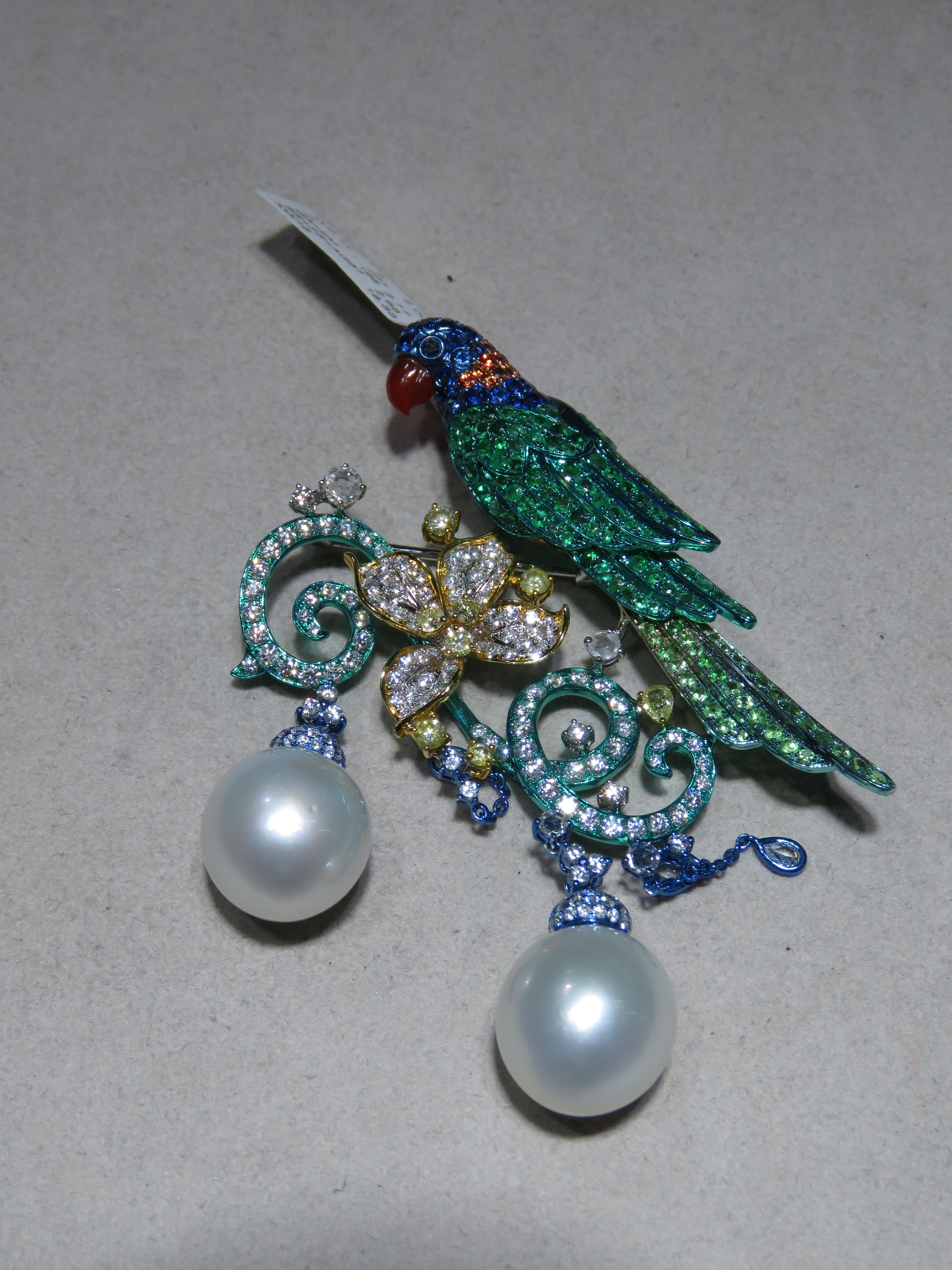 The Following Item we are offering is a Rare Important 18KT Gold Radiant Sapphire and Diamond Parrot Brooch Pin Pendant. This Rare Piece Magnificent Rare Multi Colored Sapphires, Large South Sea Pearls, Fancy Gem Apatite, Emeralds, Agate, and