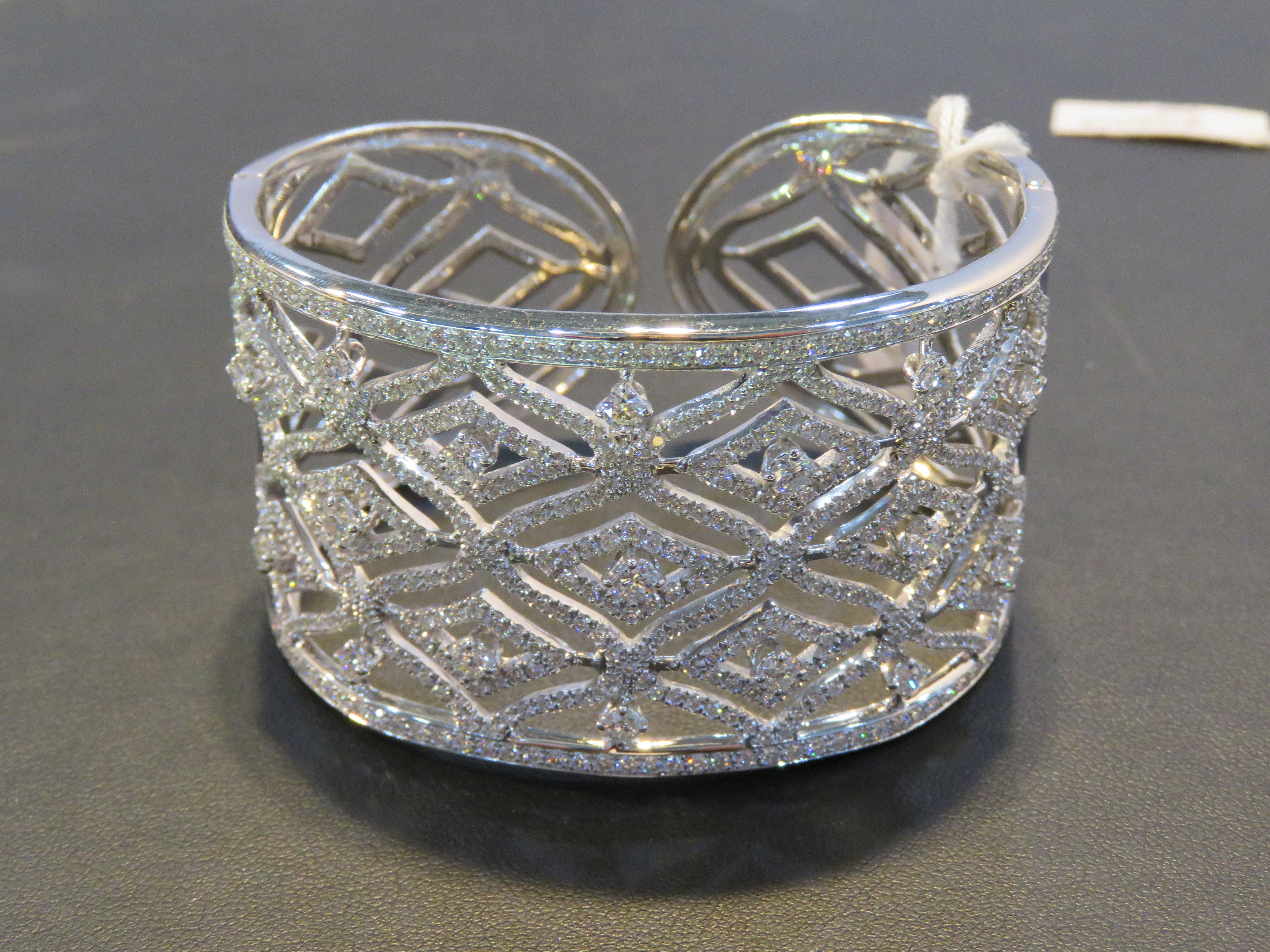 The Following Item we are offering is a Rare Magnificent Radiant 18KT White Gold Large Rare Gorgeous Fancy Diamond Wide Bangle Bracelet. Bracelet is comprised of Beautiful Gorgeous Glittering Diamonds!!! T.C.W. Approx 7CTS!!! This Gorgeous Bangle is