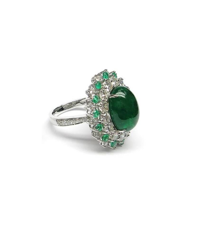 The Following Item we are offering is a Rare Important Gorgeous 18KT White Gold Winston Style Glistening Fancy Green Emerald and Diamond Ring!!!! Ring features an Outstanding Rare Large Fancy Emerald surrounded with a Burst of Gorgeous Magnificent