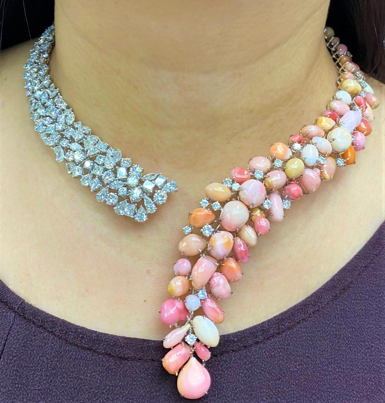 The Following Item we are Offering is this Magnificent 18KT Gold Large Extremely Rare Conch Pearl and Fancy Diamond Necklace. This Gorgeous Necklace features Large Gorgeous Conch Pearls with Shades of Oranges and Pinks. Beautifully done with a