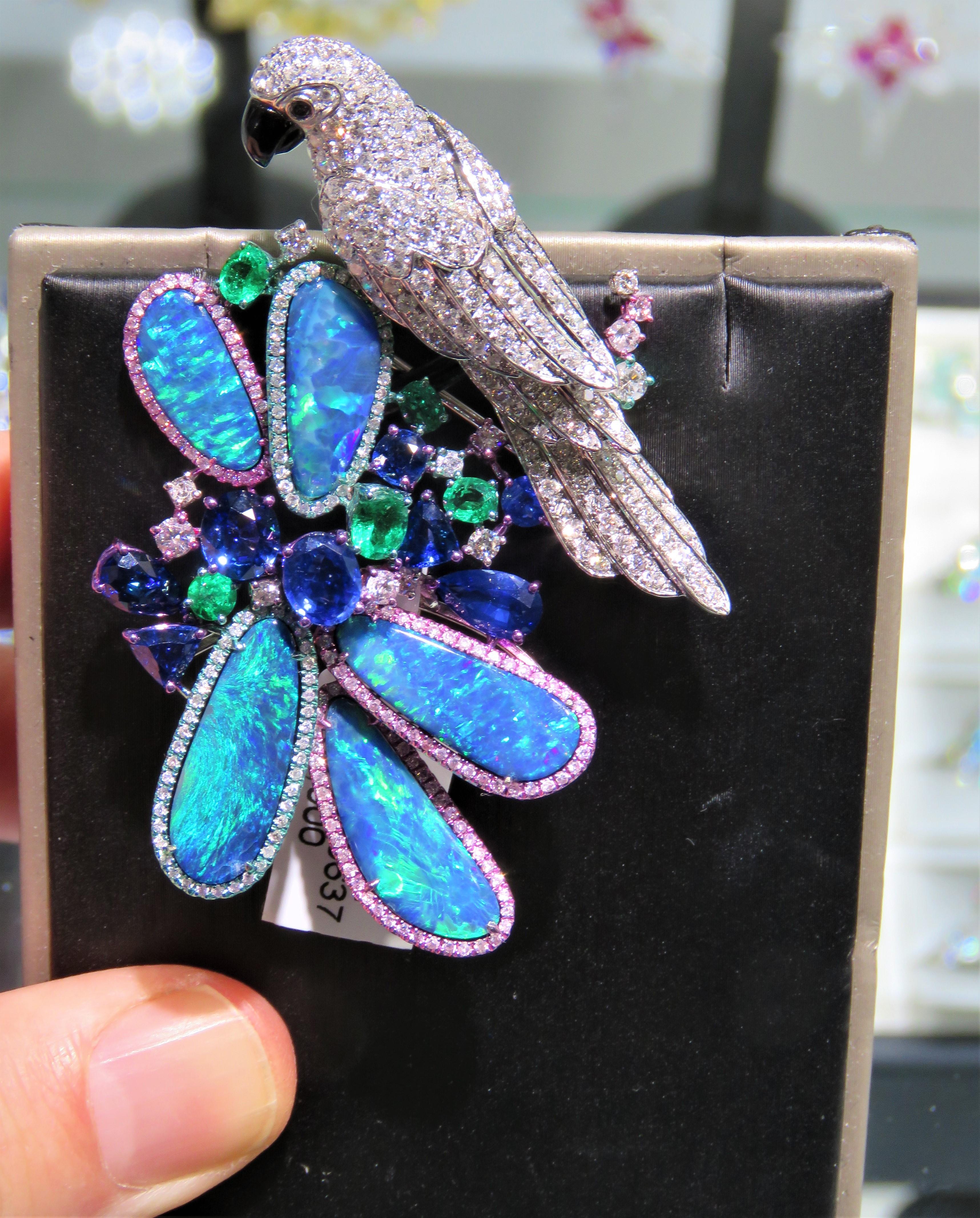 The Following Item we are offering is a Rare Important Radiant 18KT Gold Glistening Australian Black Opal and Diamond Parrot Brooch Pin. Brooch features Magnificent Rare Color Changing Black Opal from Australia with  Exquisite Round Diamonds and