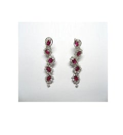Pendants d'oreilles fantaisie en or 18 carats avec rubis 10 carats et diamants, 48 000 $, neuves avec étiquette