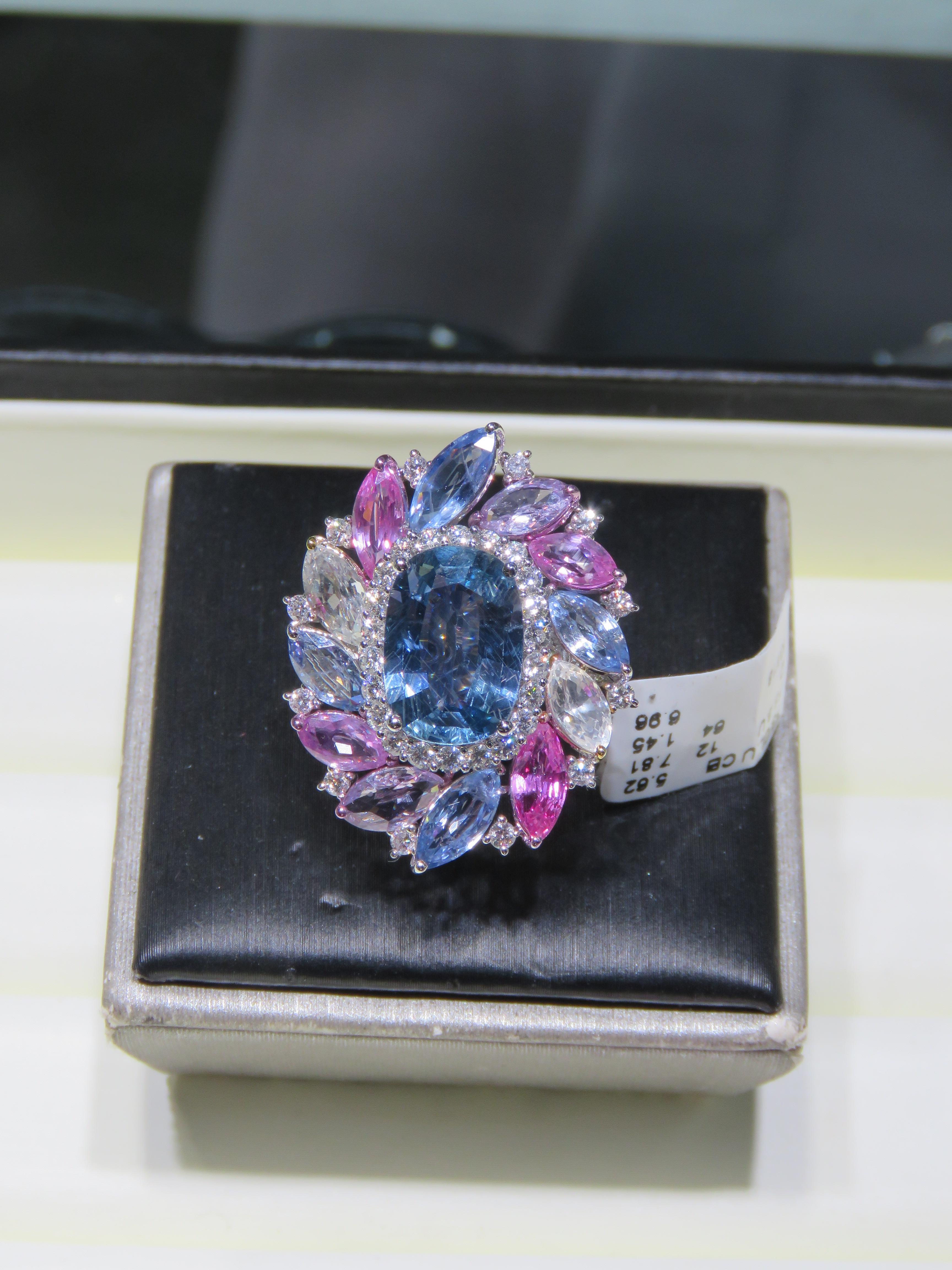The Following Item we are offering is a Rare Important Spectacular and Brilliant 18KT Gold Large Gorgeous Fancy Natural Sapphire Spinel Ring. Ring consists of Rare Fine Magnificent Blue Sapphire surrounded and Framed with Beautiful Glittering Multi