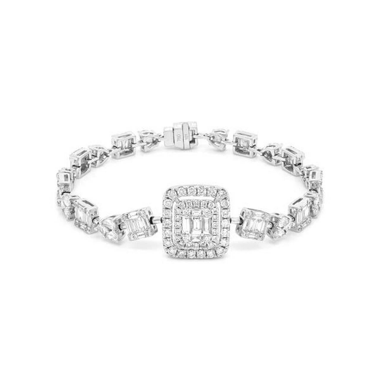 The Following Item we are offering is this Beautiful Rare Important 18KT White Gold Brilliant White Diamond Fancy Elaborate Baguette Diamond Bracelet. Bracelet is comprised of over 5CTS of Magnificent Rare Gorgeous Rare Fancy Glittering Diamonds!!!