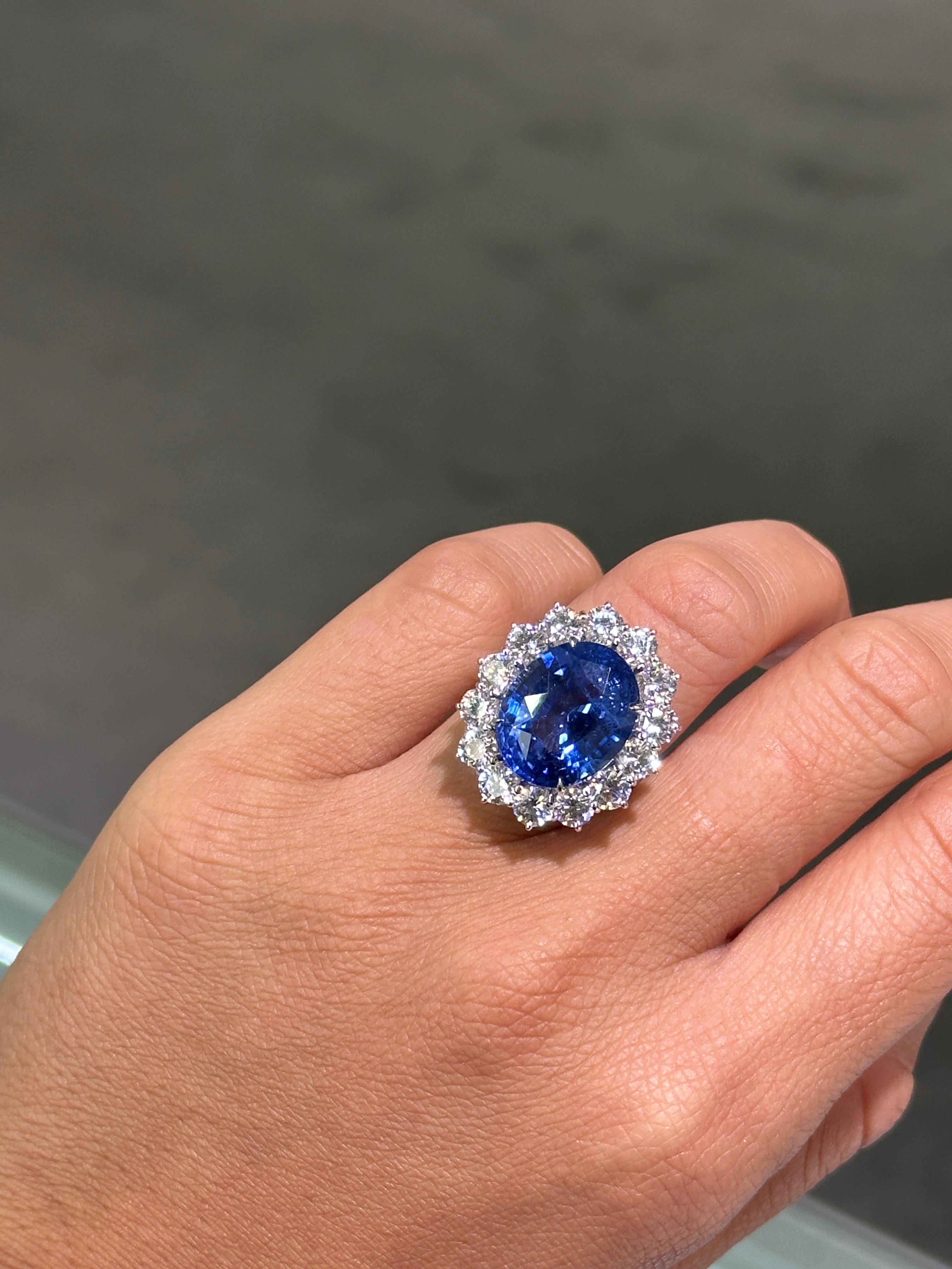 The Following Item we are offering is this Beautiful 18KT Gold and Platinum, Rare Important Large 19CT Large Natural Blue Ceylon Sapphire Diamond Ring!!! Magnificent Large Blue Sapphire Center Stone accompanied surrounded by a Halo of Large Round