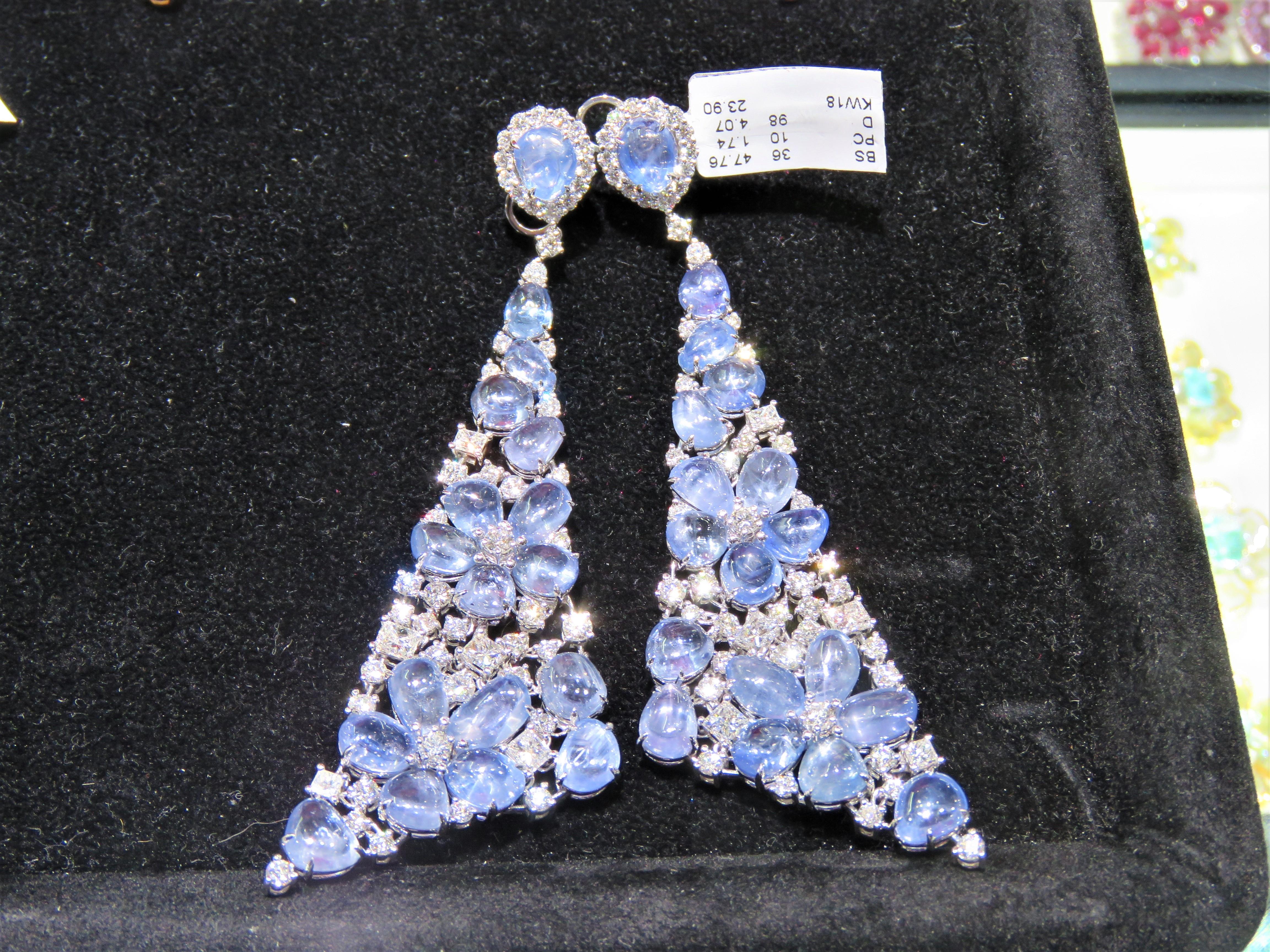 The Following Item we are offering are these Extremely Rare Beautiful 18KT Gold Fine Large Fancy Cabochon Sapphire and White Diamond Dangle Earrings. Each Earring features Rare Gorgeous Glittering Fancy Large Sapphire Cabochons adorned with