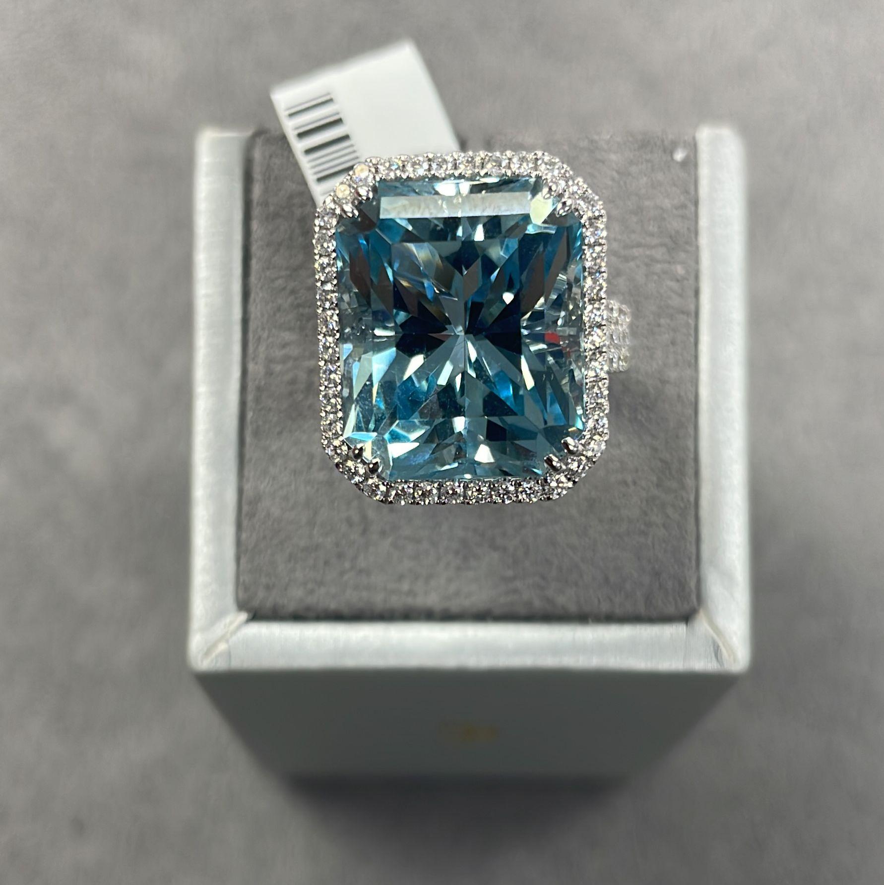 The Following Item we are offering is this Beautiful 18KT Gold Rare Important Large Magnificent Fancy Aquamarine and Diamond Ring!!! Magnificent Large Aquamarine Center Stone accompanied surrounded with a Halo of Round Glittering Diamonds and