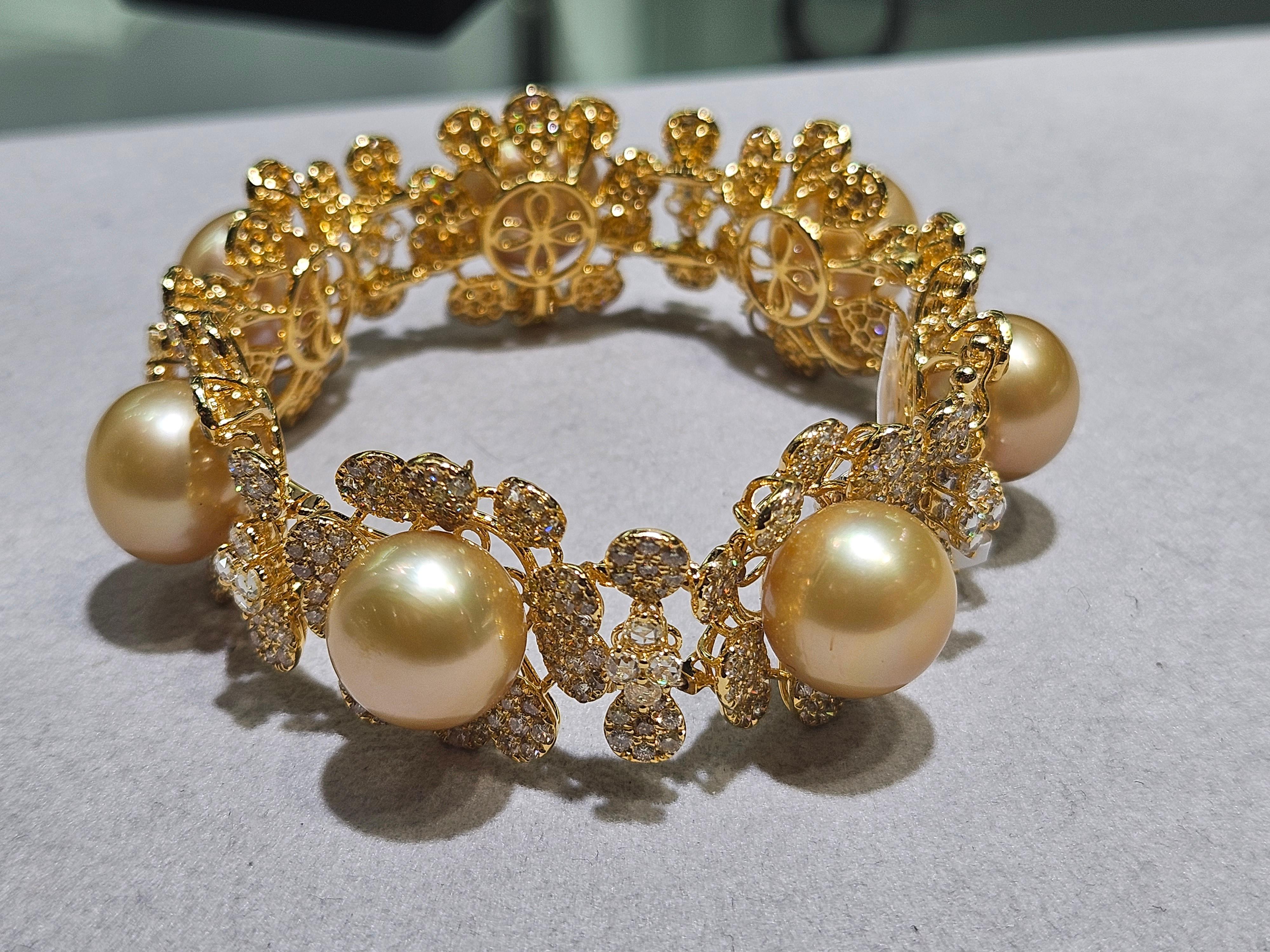 The Following Item we are offering is this Beautiful Rare Important 18KT Gold Fancy Large Golden Pearl and Fancy Rose Yellow Diamond Bracelet. Bracelet  is comprised of 7 Beautiful Magnificent High Luster Large AA-AAA GOLDEN PRISTINE SOUTH SEA
