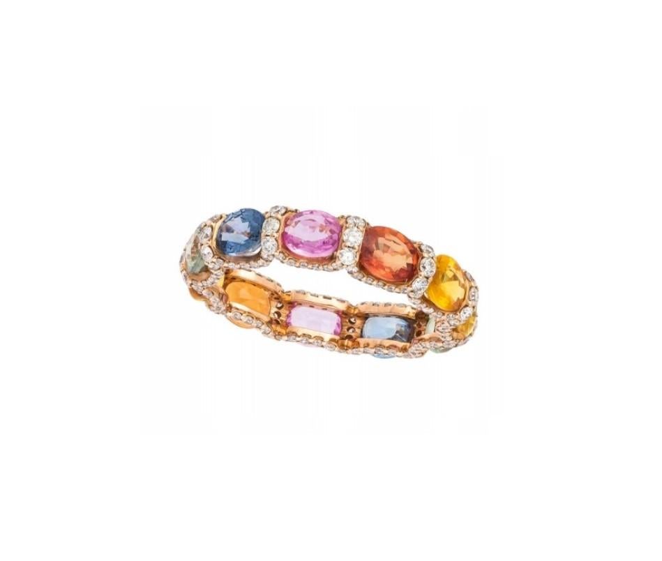 The Following Item we are offering is a Rare Important Radiant 18KT Gold Rare Gorgeous Fancy Multi Rainbow Sapphire and Diamond Ring Band. Ring is comprised of a Gorgeous Array of Fancy Colored Sapphires with Glittering Diamond Spacers!!! T.C.W.
