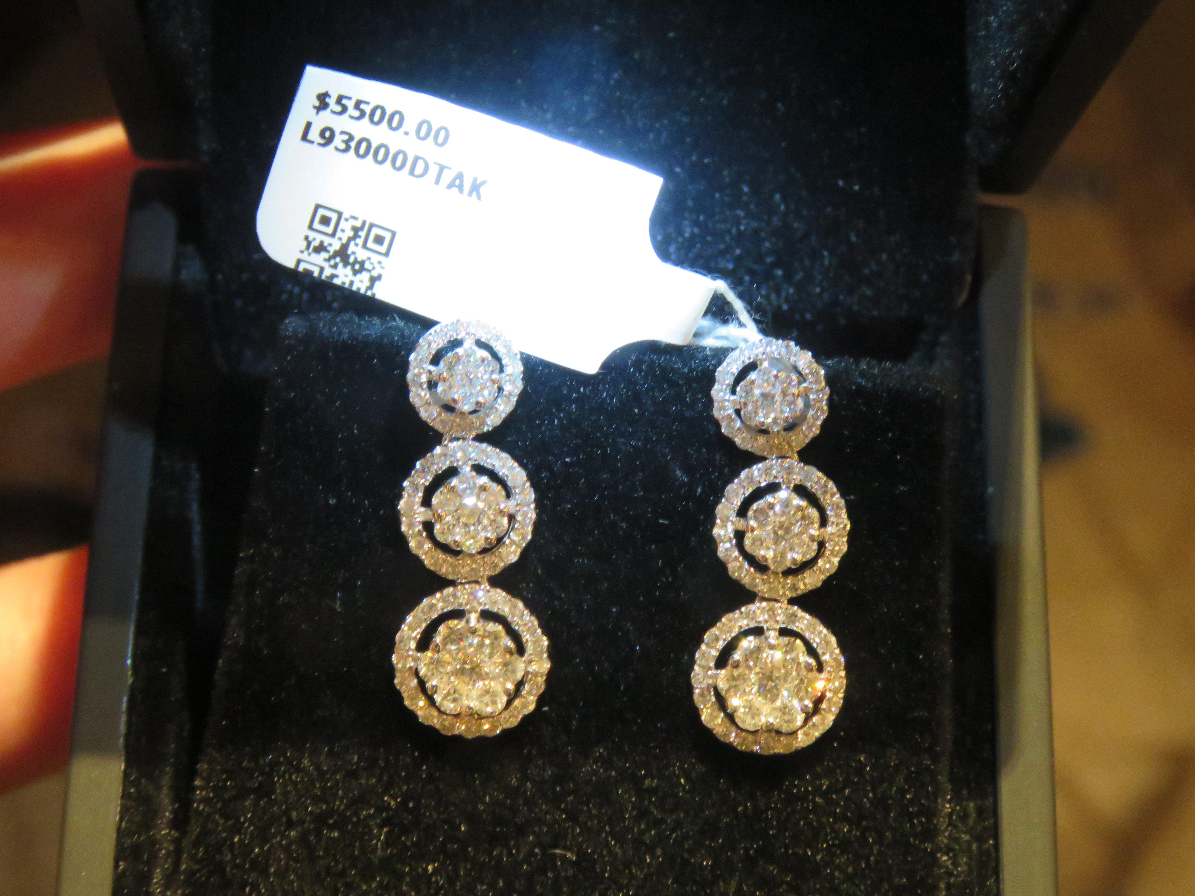 The Following Items we are offering is a Rare Important Radiant Pair of 18KT Gold Gorgeous Large Glittering Diamond Dangle Earrings. Stones are Very Clean and Extremely Fine! T.C.W. for Earrings Approx 1.50 CTS!!! From a Private Manufacturer that
