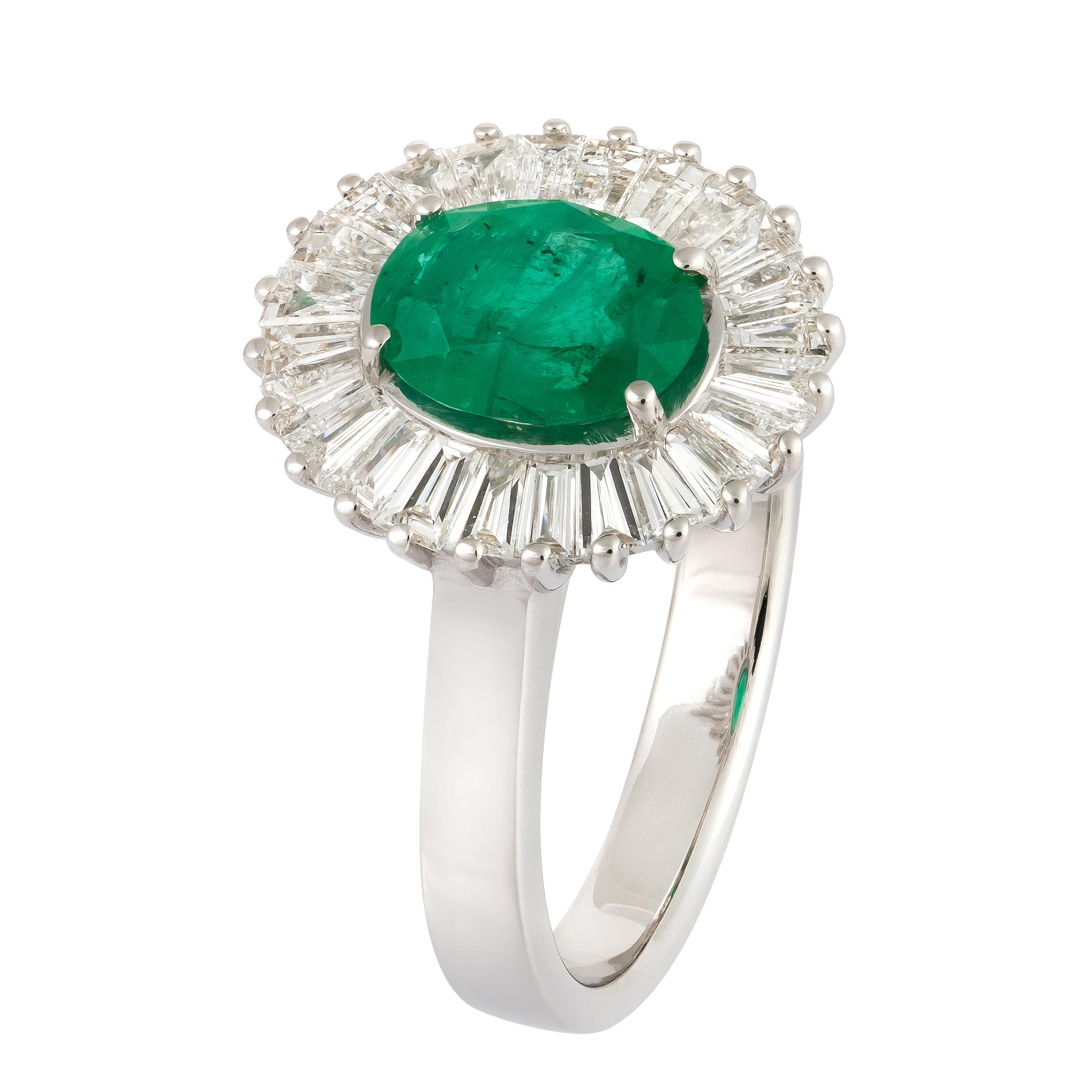 The Following Item we are offering is this Rare Important Radiant 18KT Gold Gorgeous Glittering and Sparkling Magnificent Fancy Oval Shaped Green Emerald and Fancy Trillion Baguette Diamond Ring. Ring Contains approx 2CTS of Beautiful Fancy Oval Cut
