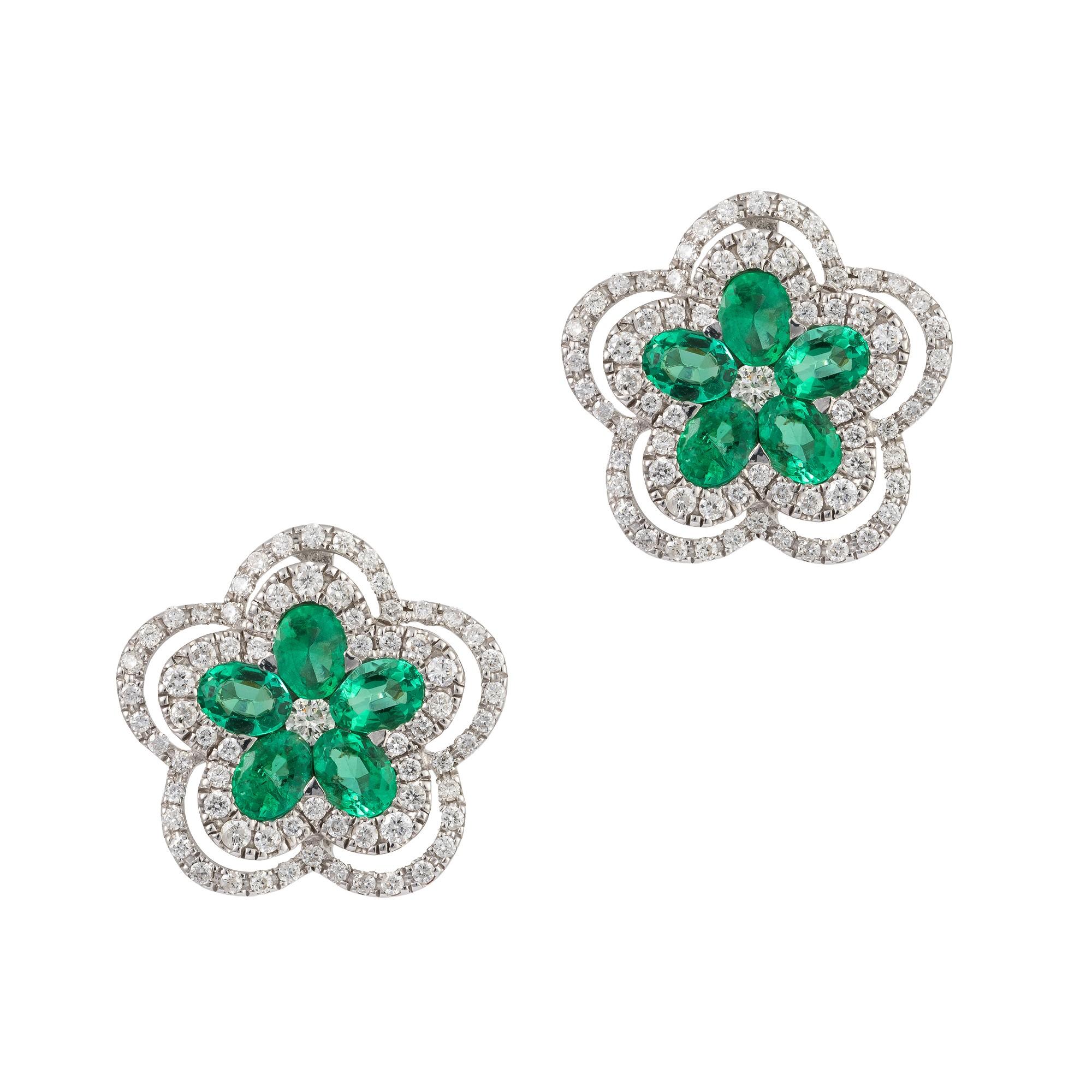 The Following Item we are offering is this Rare Important Radiant 18KT Gold Gorgeous Glittering and Sparkling Magnificent Fancy Emerald and Diamond Earrings. Earrings Contains over 2CTS of Beautiful Fancy Cut Emeralds and Diamonds!!! Stones are Very