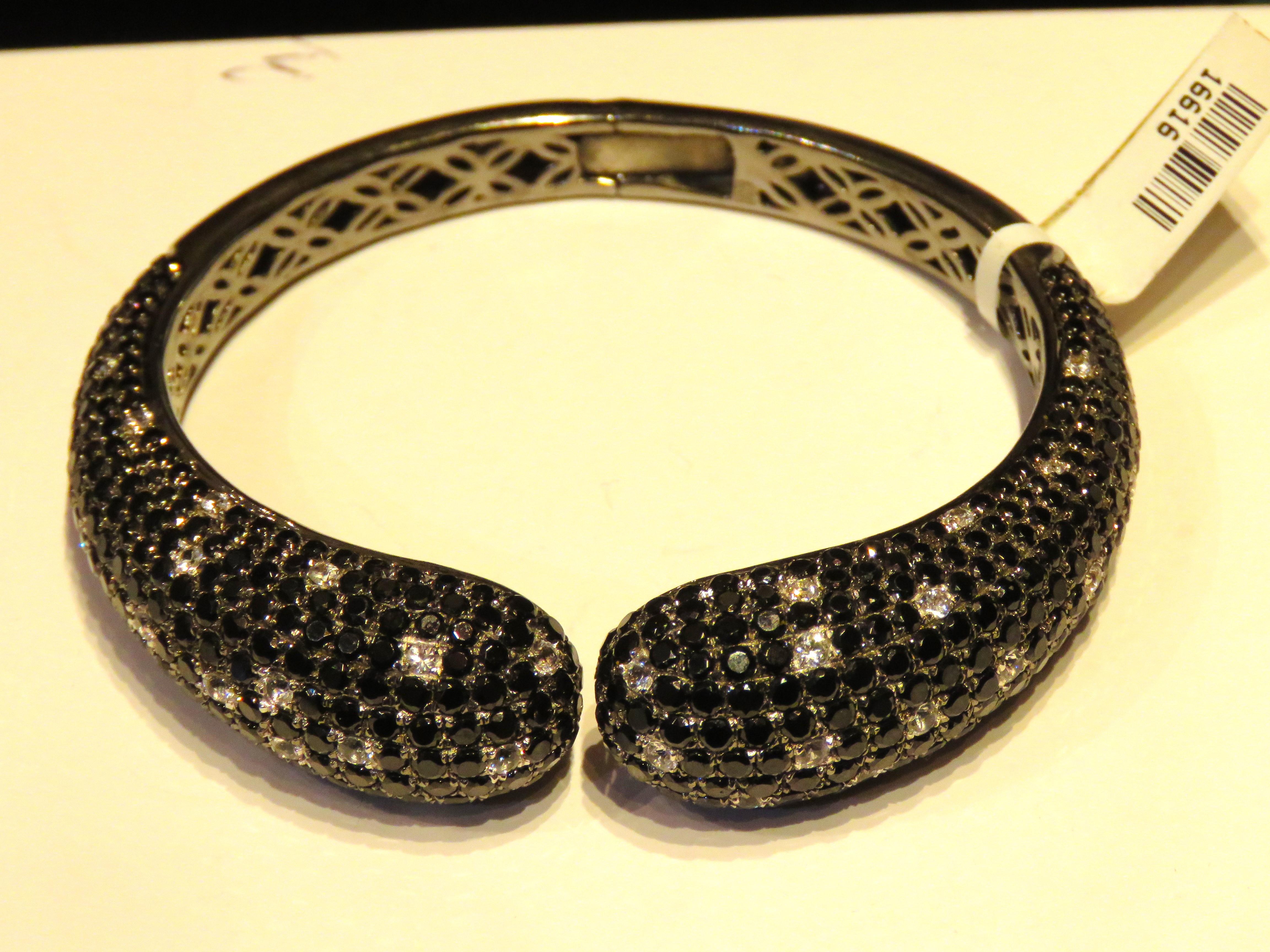 The Following Item we are offering is this Rare Magnificent FANCY BLACK SPINEL WHITE SAPPHIRE STERLING SILVER CUFF BANGLE BRACELET. T.C.W. OVER 22CTS!!! This Magnificent Bangle is a Rare Sample Piece that were sold in select Five Star Hotels and