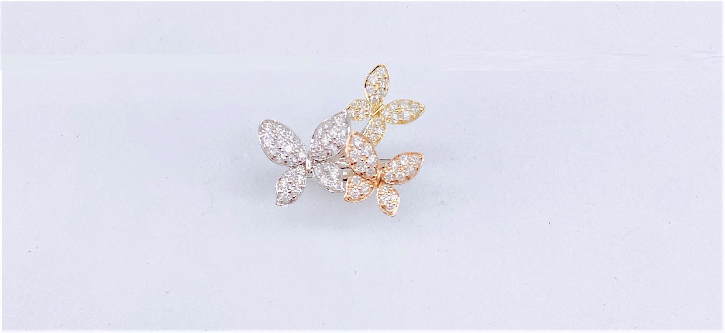 The Following Items we are offering is a Rare Important Radiant 18KT White, Yellow, Rose Gold Gorgeous Glittering Butterfly Diamond Ring Featuring Three Gorgeous Diamond 18KT Yellow and White Gold Rose Gold Butterflies with Spectacular Round