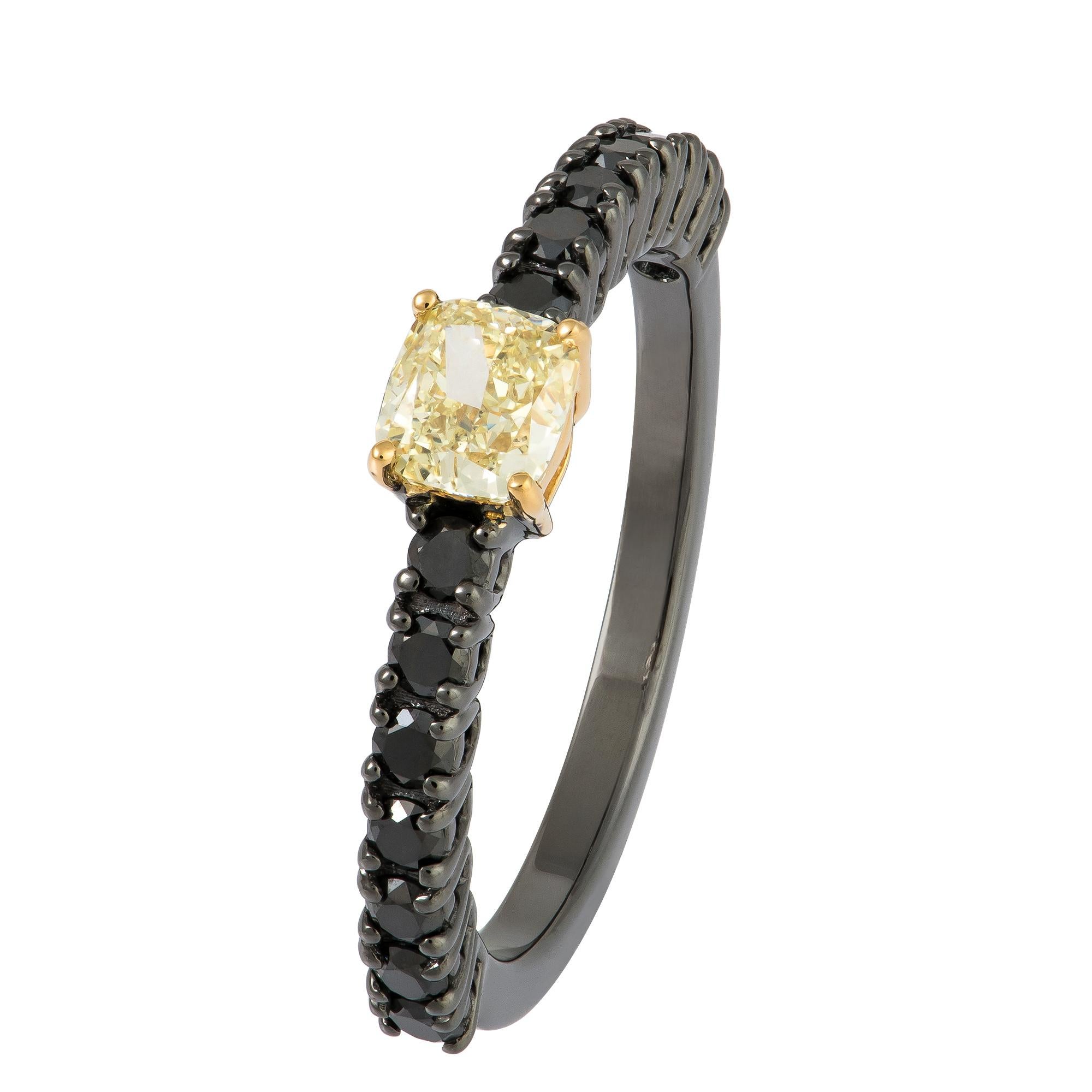 The Following Item we are offering is a Rare 18KT Gold Rare Fancy Yellow Diamond Black Diamond Ring. Beautifully comprised of Finely Set Gorgeous Yellow Diamond and adorned with Shimmering Black Diamonds!! T.C.W. Approx 1CT.  This Gorgeous Ring is a