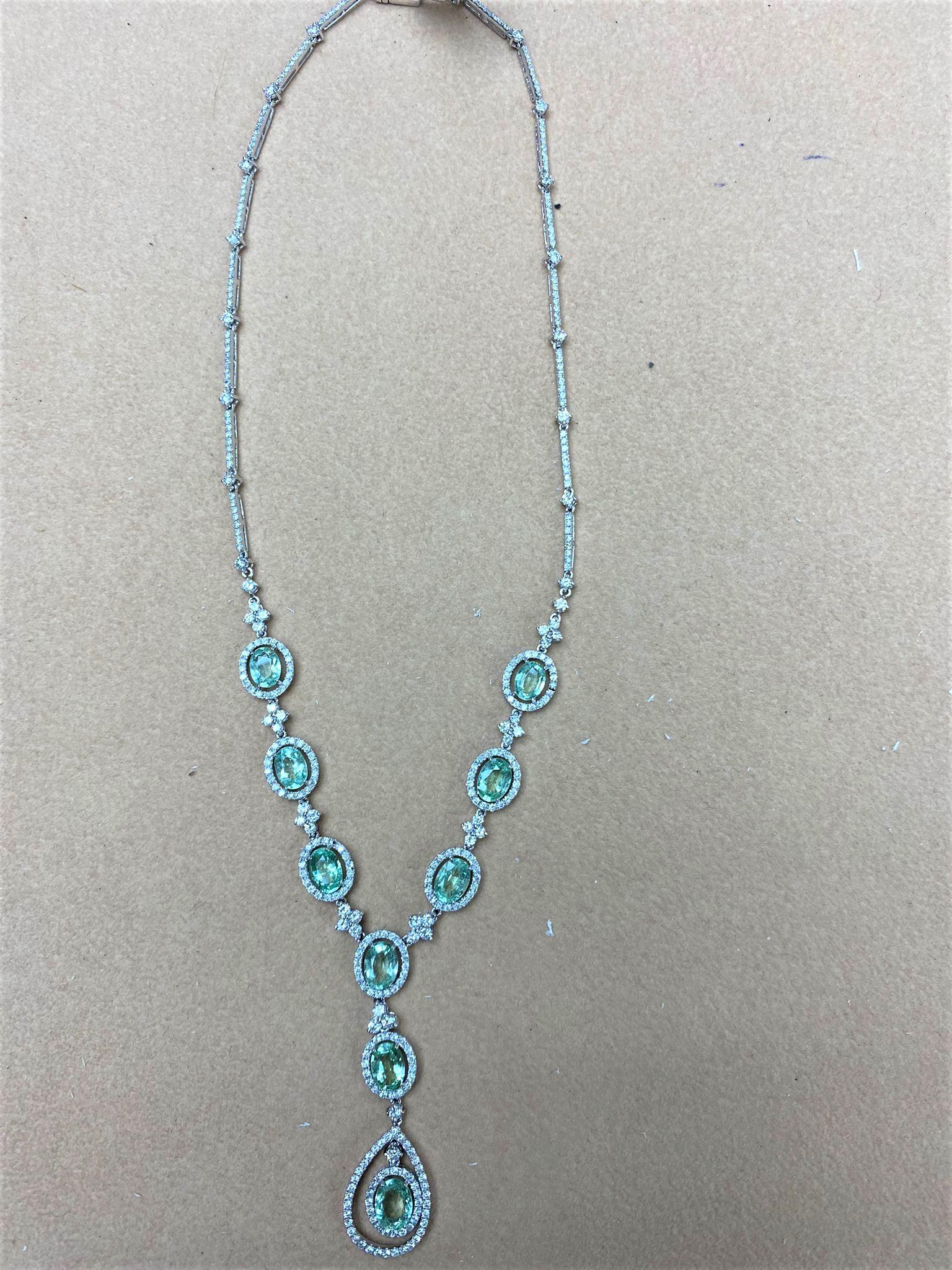 The Following Items we are offering is a Rare Important Gorgeous 18KT White Gold Glittering Diamond and Paraiba Tourmaline Necklace!!!! Necklace features Outstanding Multi Shaped Shimmering and Glittering Extremely Rare Fancy Oval Cut Paraiba