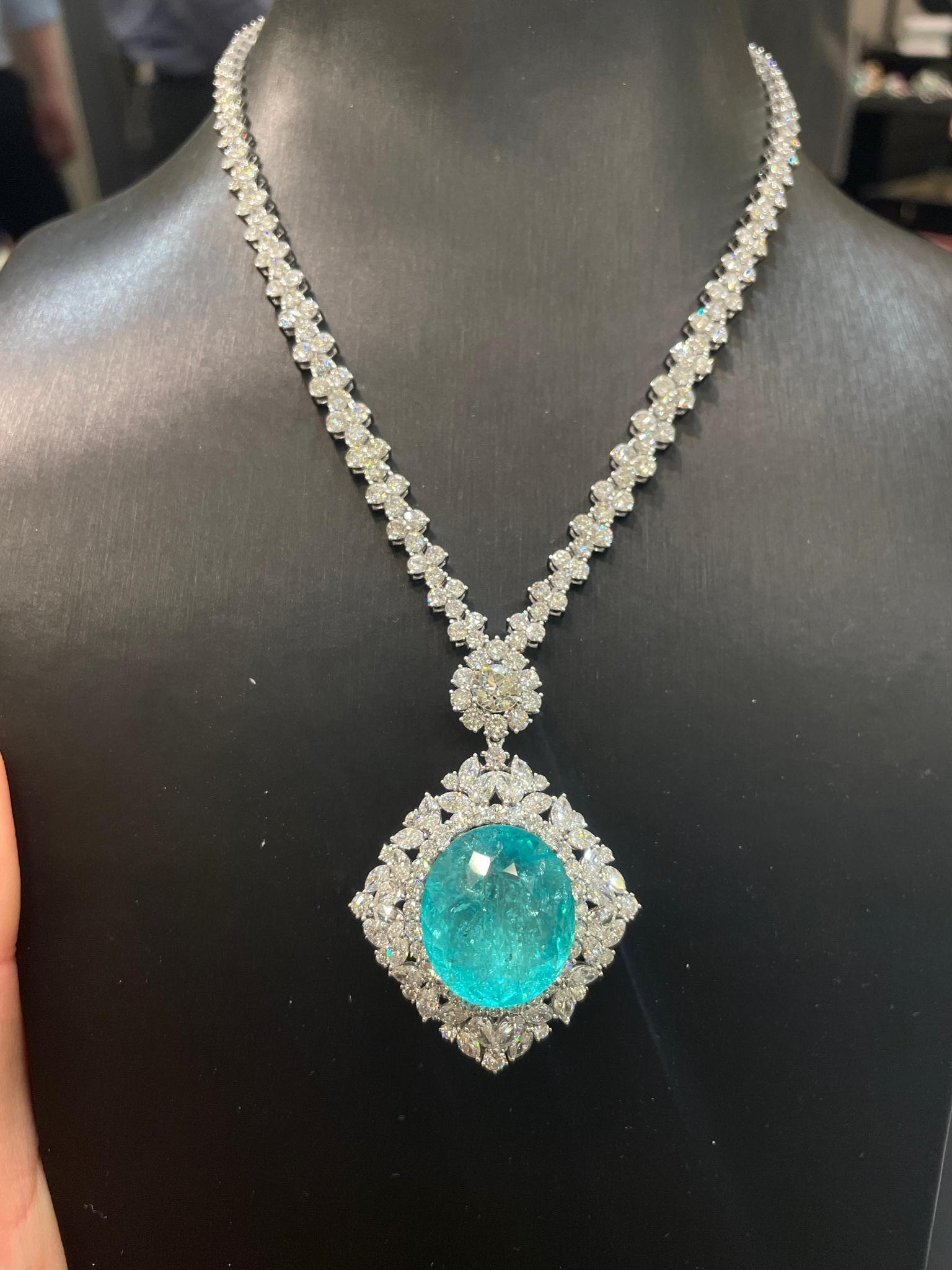 The Following Items we are offering is a Rare Important Gorgeous 18KT White Gold Glittering Diamond and Paraiba Tourmaline Necklace!!!! Necklace features Outstanding Multi Shaped Shimmering Gorgeous Extremely Rare Fancy Oval Cut Large Paraiba
