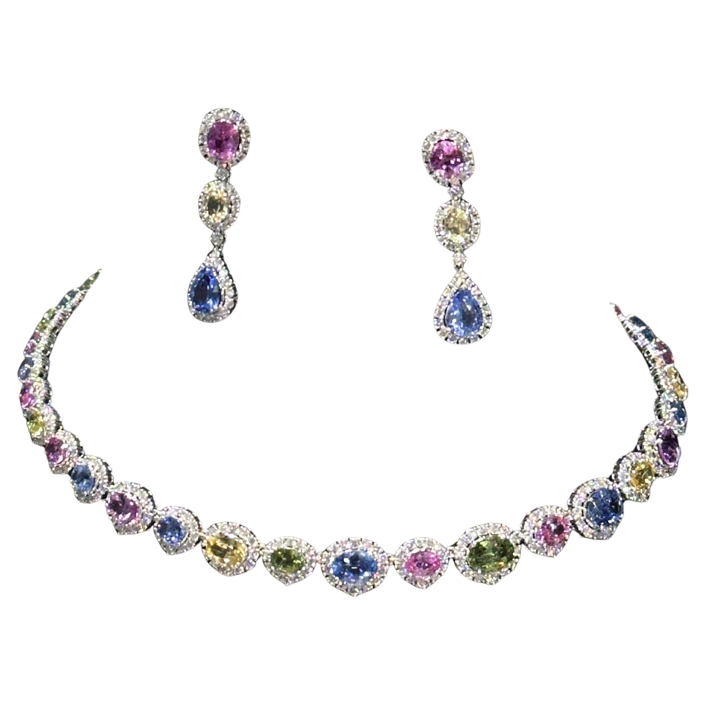 A Rare Important Gorgeous 18KT White Gold Exquisite Glittering Natural Fancy Colored Sapphire Diamond Earrings!!! Earrings feature Outstanding Shimmering Gorgeous Extremely Rare Large Fancy Multi Colored Sapphires adorned with Large Fancy Glittering