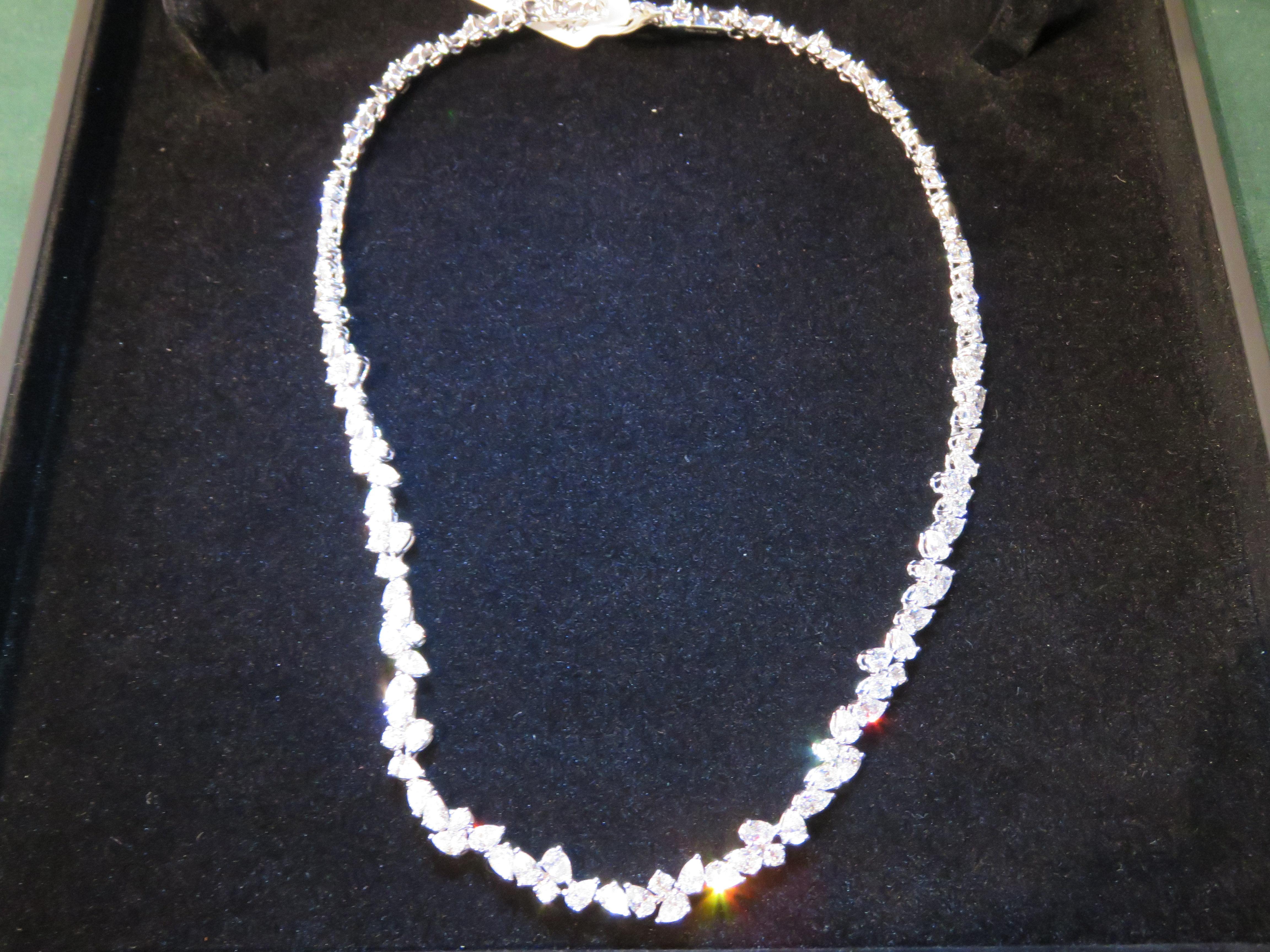 The Following Item we are offering is this Beautiful Rare Important 18KT Gold Gorgeous Glittering Sparkling White Diamond Necklace. Necklace is comprised of Large Pear Shaped Diamonds adorned with Fine Glittering Round Diamonds!!! The Stones are of