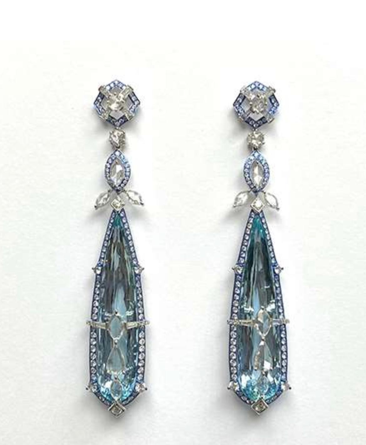 The Following Items we are offering are a Rare Important Pair of Spectacular and Beautiful IMPORTANT & EXQUISITE 18KT Gold with Platinum Large Gorgeous Aquamarine and Rose Cut, Trillion Diamond, Round Diamond Dangle Earrings. Earrings consists of