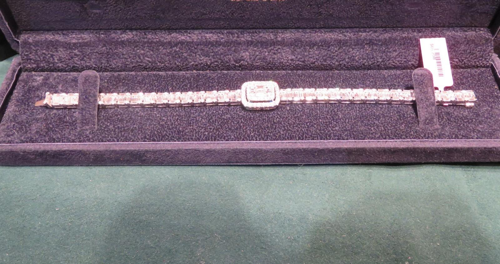 The Following Item we are offering is this Beautiful Rare Important 18KT Gold Sparkling Baguette Diamond Bracelet. This Rare Bracelet features an Array of Magnificent Rare Gorgeous Glittering Diamonds. T.C.W. Approx 7CTS!!
The Diamonds are of