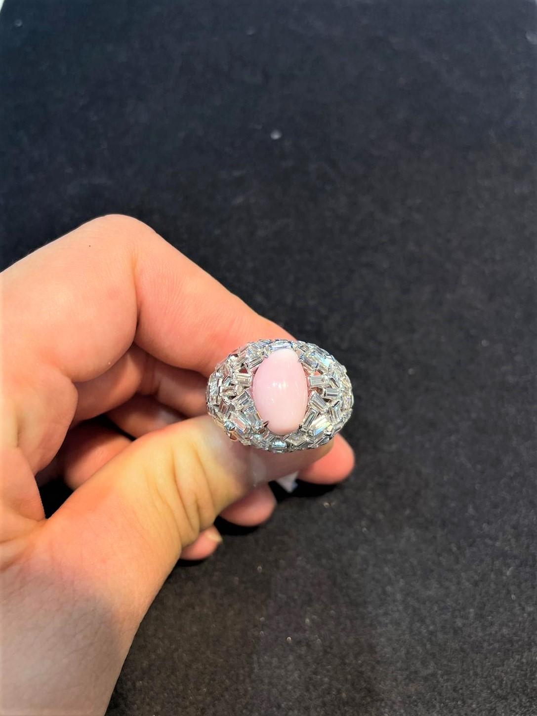 The Following Item we are Offering is this Magnificent 18KT Gold Large Extremely Rare Conch Pearl and Fancy Baguette Diamond Ring. This Gorgeous Ring features a Large Gorgeous Conch Pearl sitting atop Fancy Glittering Baguette Diamonds!! T.C.W