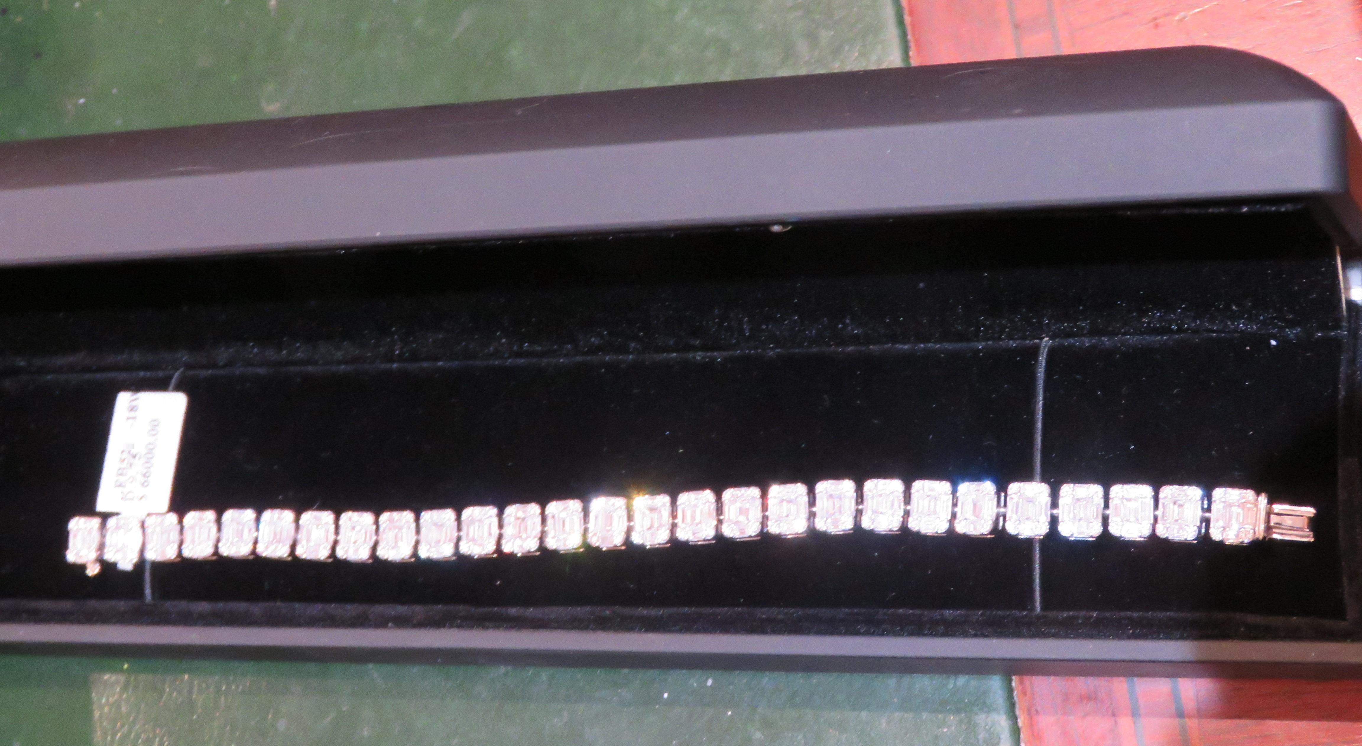 The Following Item we are offering is a Rare 18KT White Gold Large Baguette Diamond Bracelet. Bracelet is comprised of Finely Set Gorgeous Glittering Diamonds!! T.C.W. Approx 10CTS!! This Gorgeous Sample from a Private Top Manufacturer that sold to