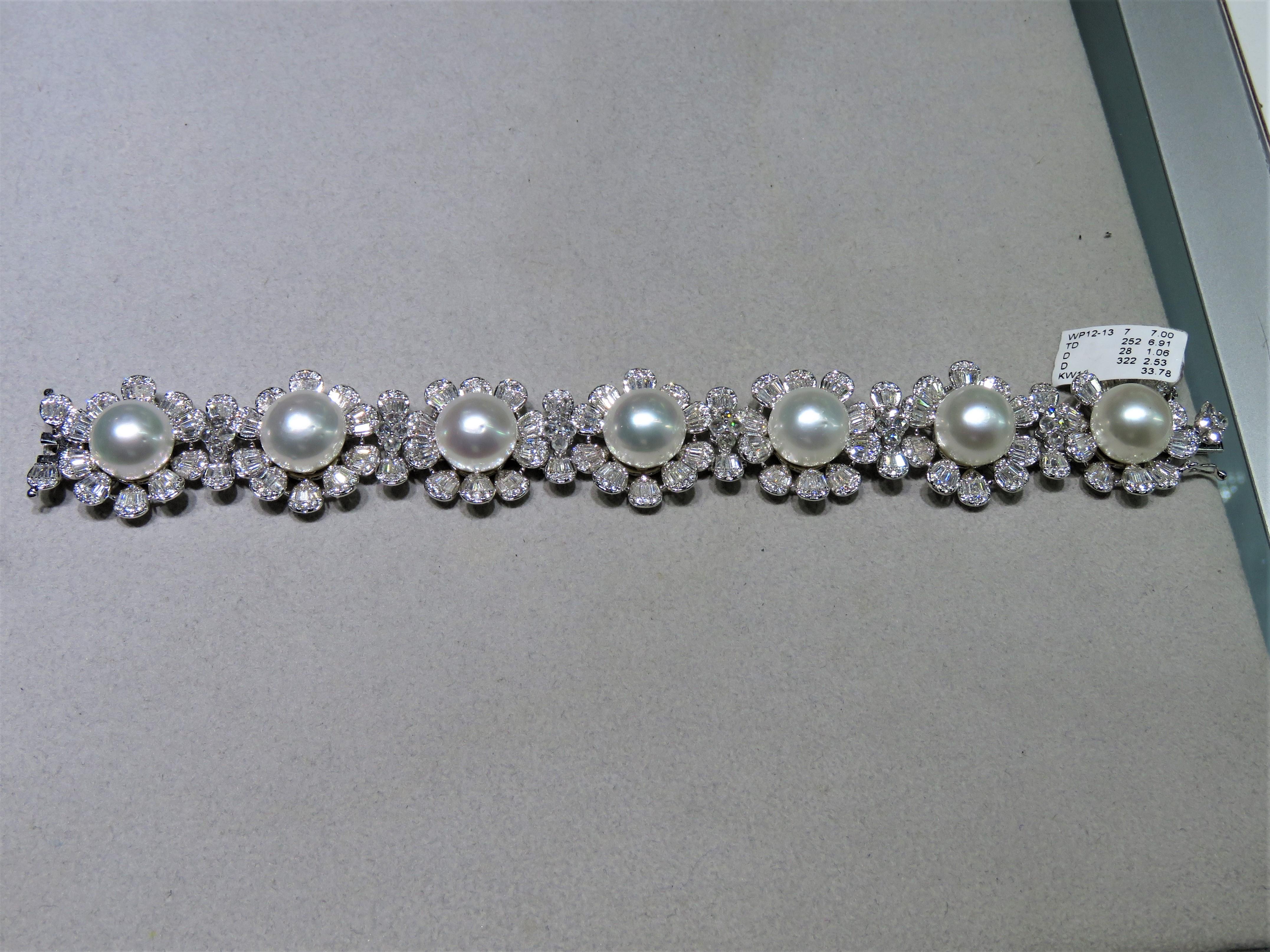 The Following Item we are offering is this Extremely Rare Beautiful 18KT Gold Fine Rare Large South Sea Pearl Fancy Diamond Bracelet. This Magnificent Bracelet is comprised of Rare Fine Large South Sea Pearls with Gorgeous Glittering Diamonds!!!