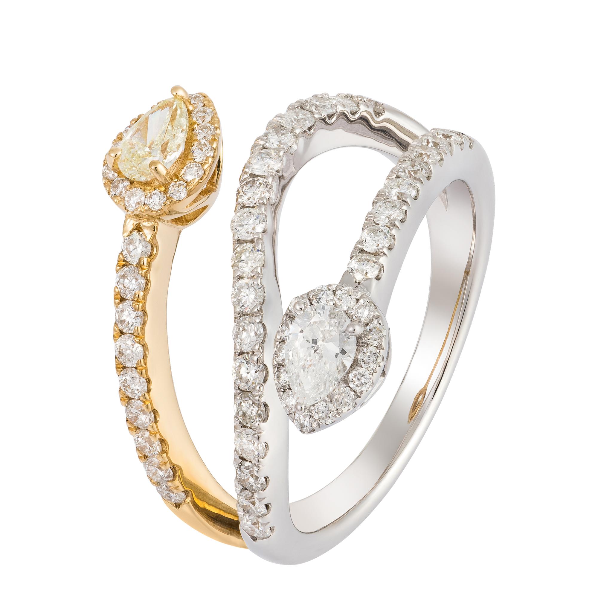L'article suivant que nous vous proposons est cette magnifique bague en or 18KT avec un grand diamant jaune de taille fantaisie et un diamant blanc en forme de croix. La bague est composée d'un magnifique diamant poire jaune et d'un diamant poire