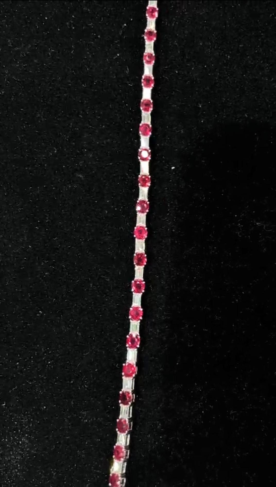 The Following Item we are offering is this Rare Important Radiant 18KT Gold Gorgeous Glittering and Sparkling Magnificent Fancy Rare Burmese Ruby and Diamond Tennis Bracelet. Bracelet contains over 11CTS of Beautiful Fancy Burmese Rubies and Large