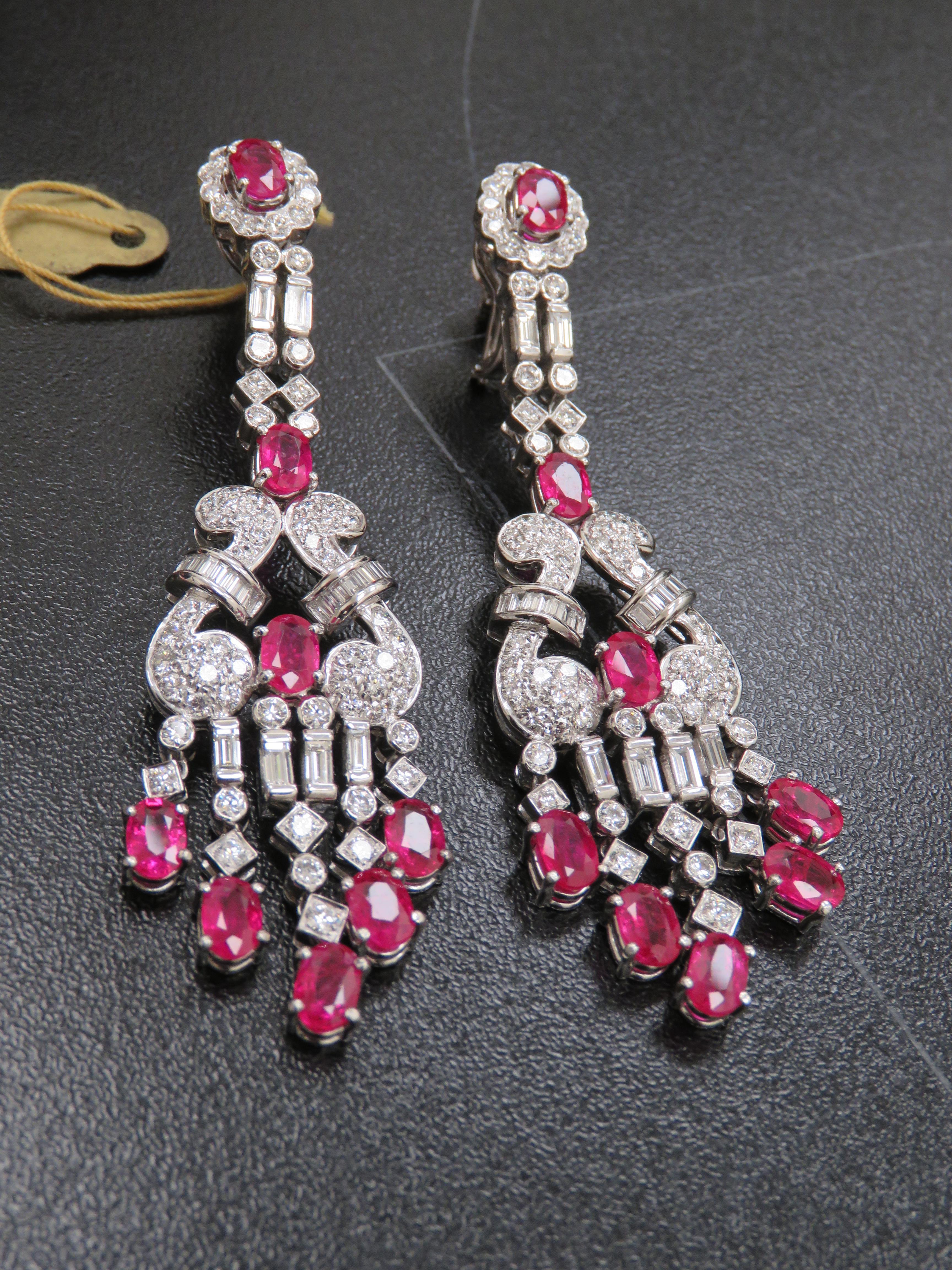 The Following Item we are offering is this Rare Important Pair of Radiant 18KT Gold Gorgeous Glittering and Sparkling Magnificent Fancy Red Ruby Diamond Earrings. Earrings contain approx 8.25CTS of Beautiful Fancy Cut Rubies and Diamonds!!! Les