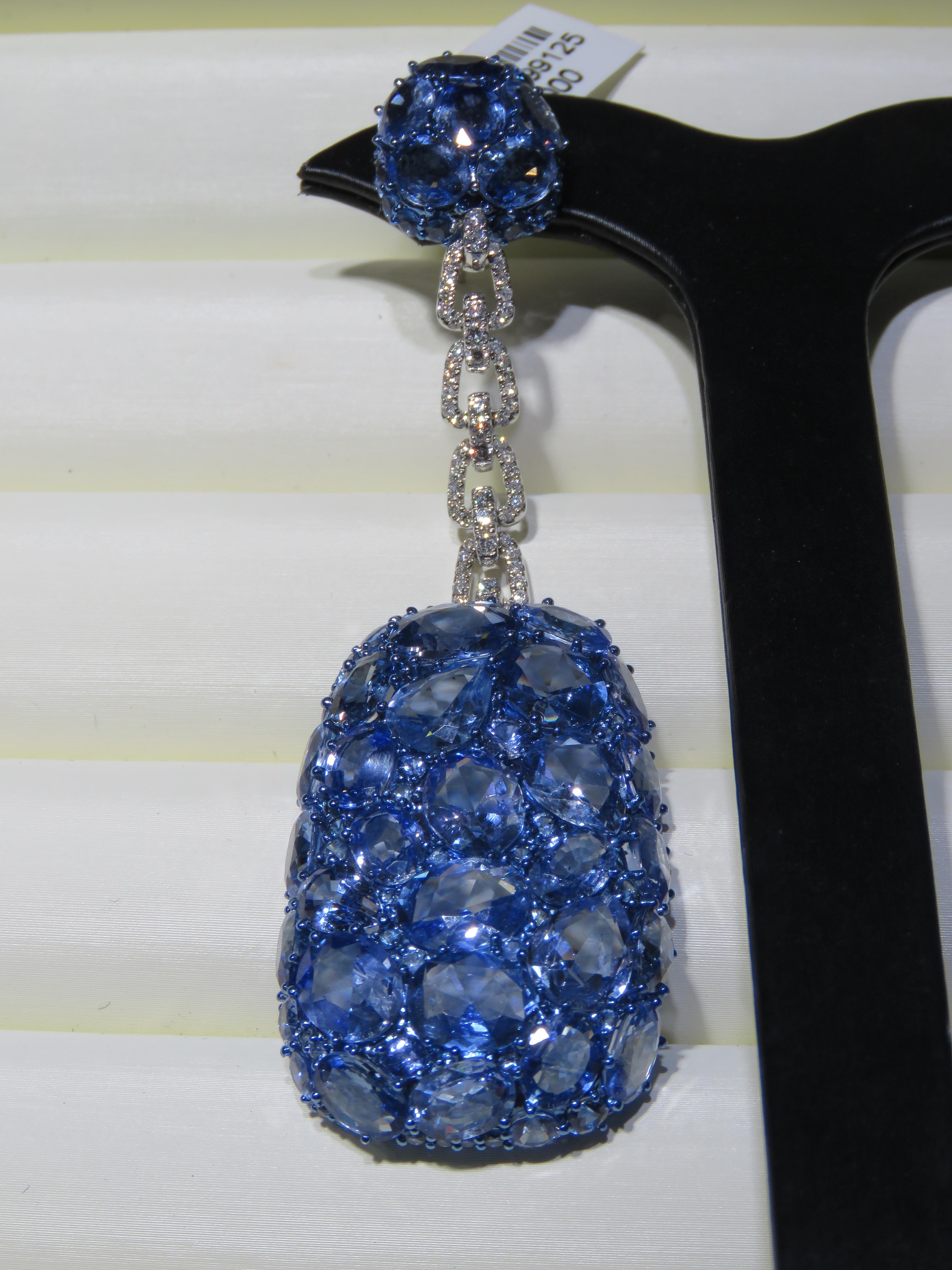 The Following Item we are offering is this Rare Important Radiant 18KT Gold Gorgeous Glittering and Sparkling Sapphire and Diamond Dangle Earrings. Earrings Contains approx 85CTS of Beautiful Fancy Sliced Sapphires and White Diamonds!!! Stones are