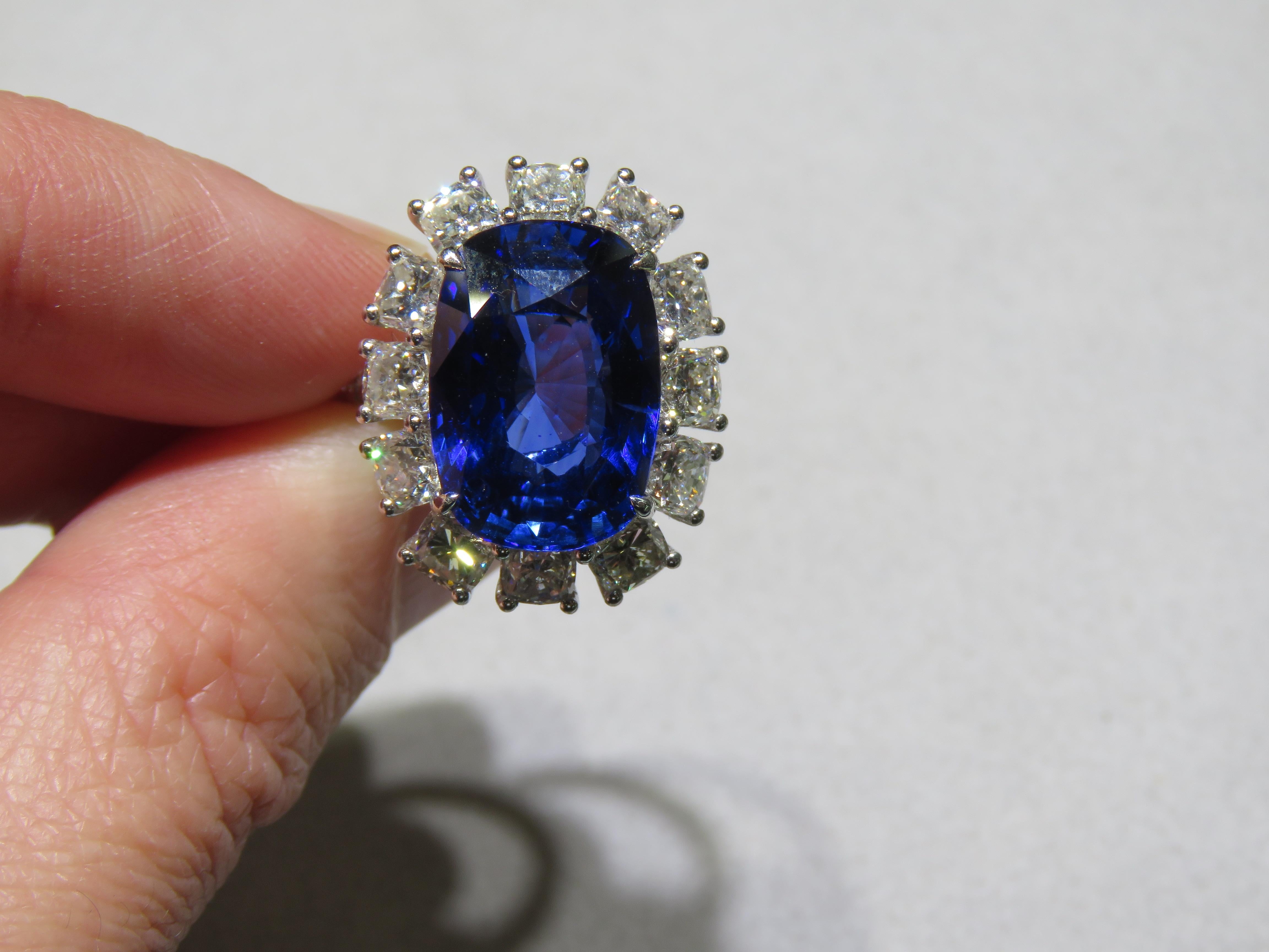 The Following Item we are offering is a Rare Important Spectacular and Brilliant 18KT Gold Large Gorgeous Sapphire Diamond Ring. Ring consists of a Rare Fine Magnificent Rare Natural Ceylon Blue Sapphire surrounded with Glittering Diamonds. T.C.W.