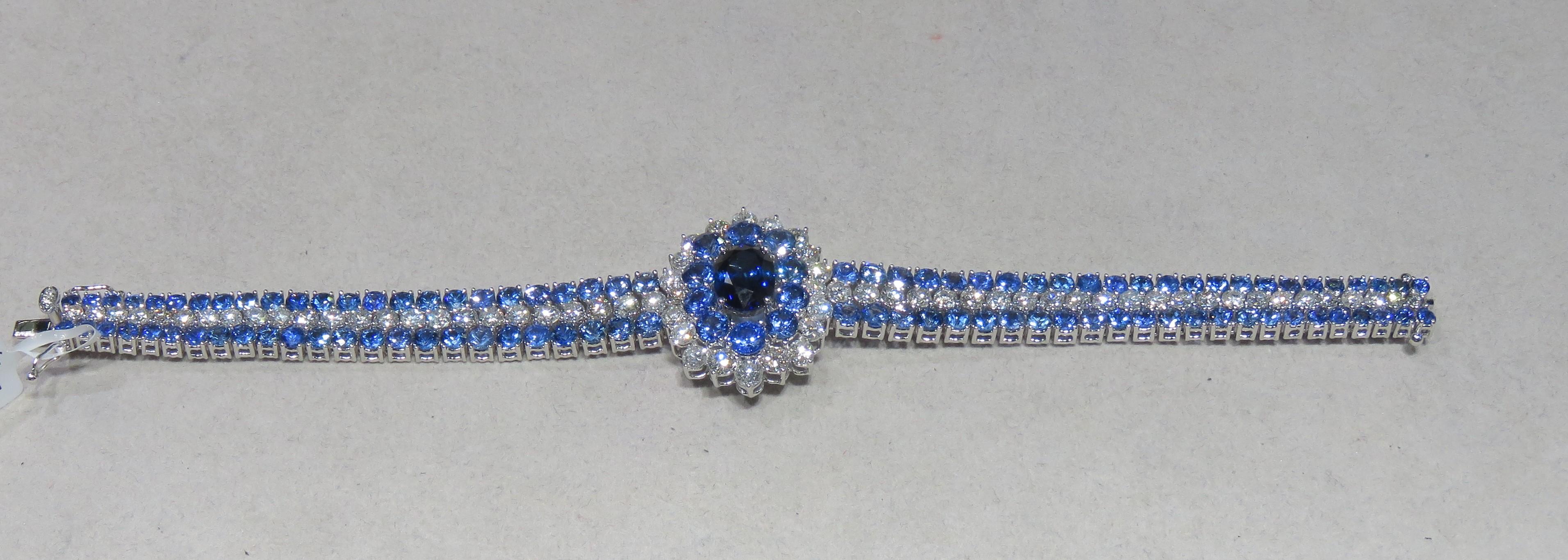 A Rare 18KT White Gold Ceylon Sapphire Diamond Bracelet. Bracelet is comprised of Finely Set Glittering Gorgeous Ceylon Sapphires and adorned with Sparkling Round Diamonds!! T.C.W. approx 30CTS!!! This Gorgeous Bracelet is a Sample Piece from a