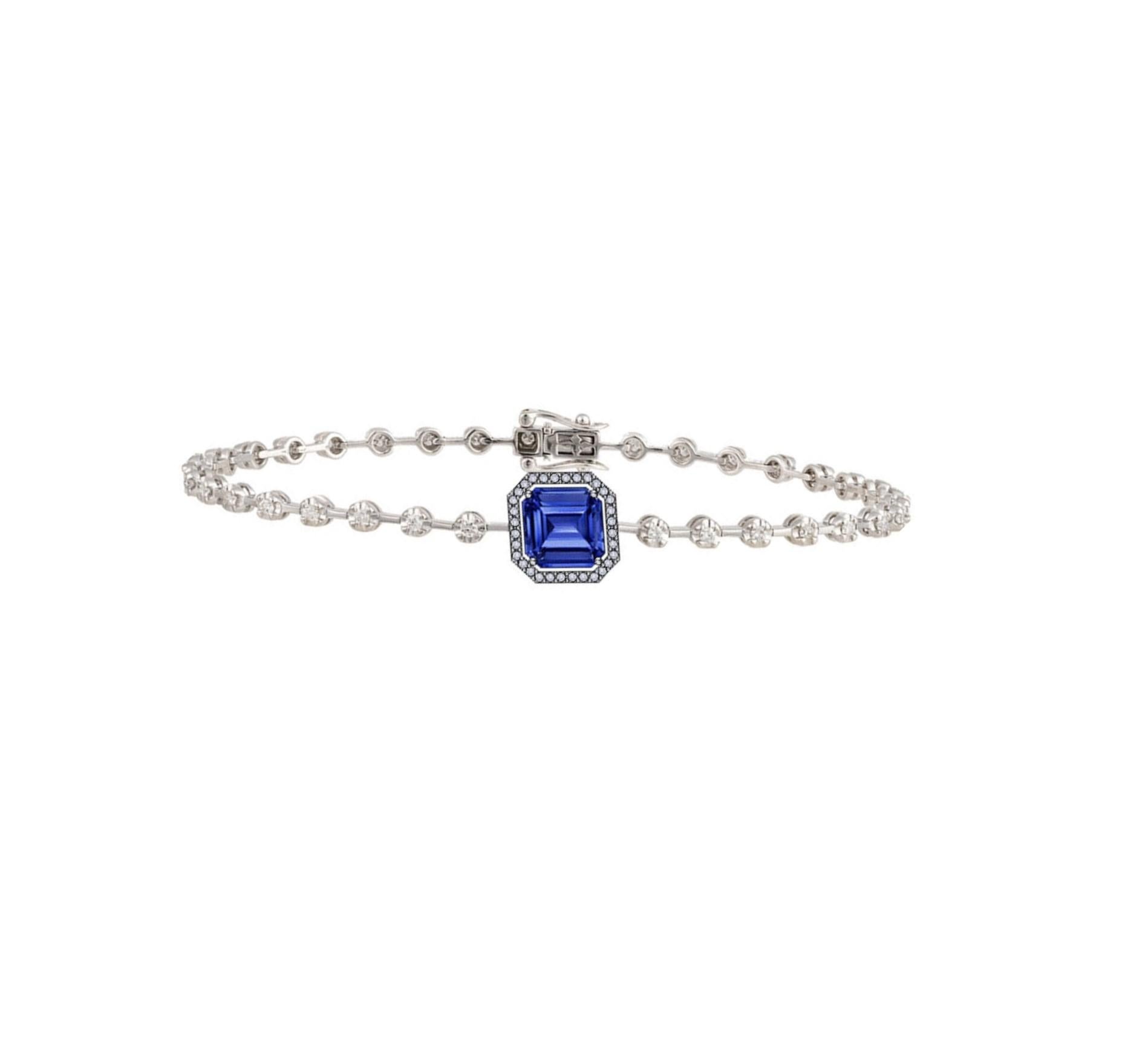 The Following Item we are offering is a Rare Important Radiant 18KT Gold Large Magnificent Rare Gorgeous Fancy Cut Tanzanite and Diamond Bracelet. Bracelet is comprised of an Exquisite Fancy Asscher Cut Tanzanite connected and interlocked with