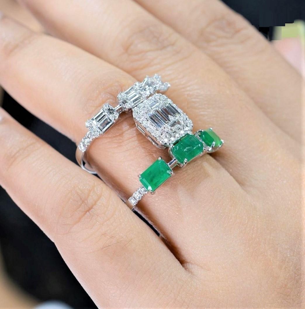 The Following Item we are offering is this Rare Important Radiant 18KT Gold Gorgeous Glittering and Sparkling Magnificent Fancy Emerald Cut Green Emerald and Fancy Baguette Cut Diamond Ring. Ring Contains approx 2.50CTS of Beautiful Fancy Cut