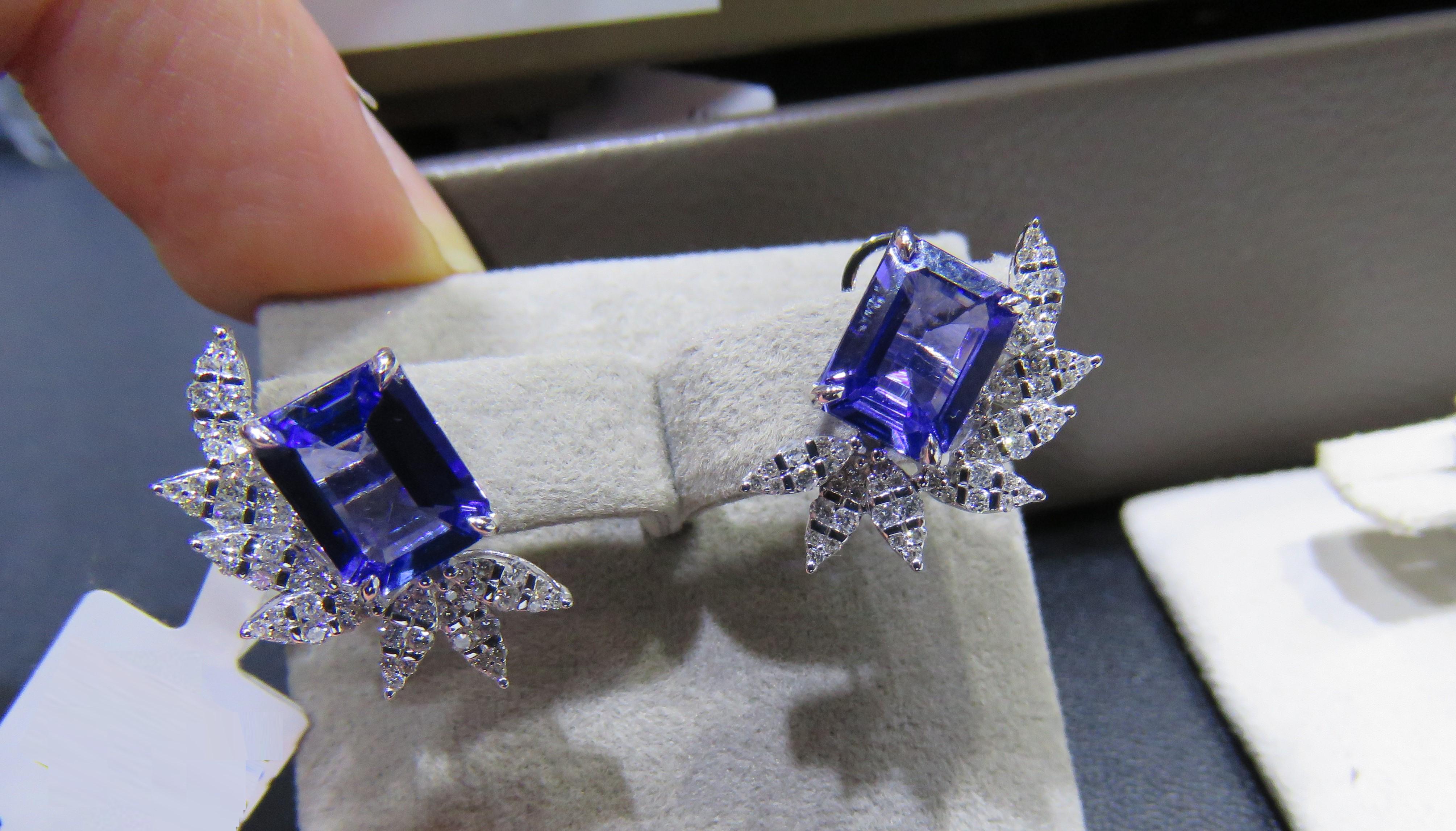 The Following Items we are offering is a Pair of Rare 18KT Gold Large Fancy Tanzanite Diamond Earrings. Earrings are comprised of Finely Set Gorgeous Large Gorgeous Fancy Colored Tanzanite Diamond Earrings!!! T.C.W. Approx 5CTS!! These Gorgeous