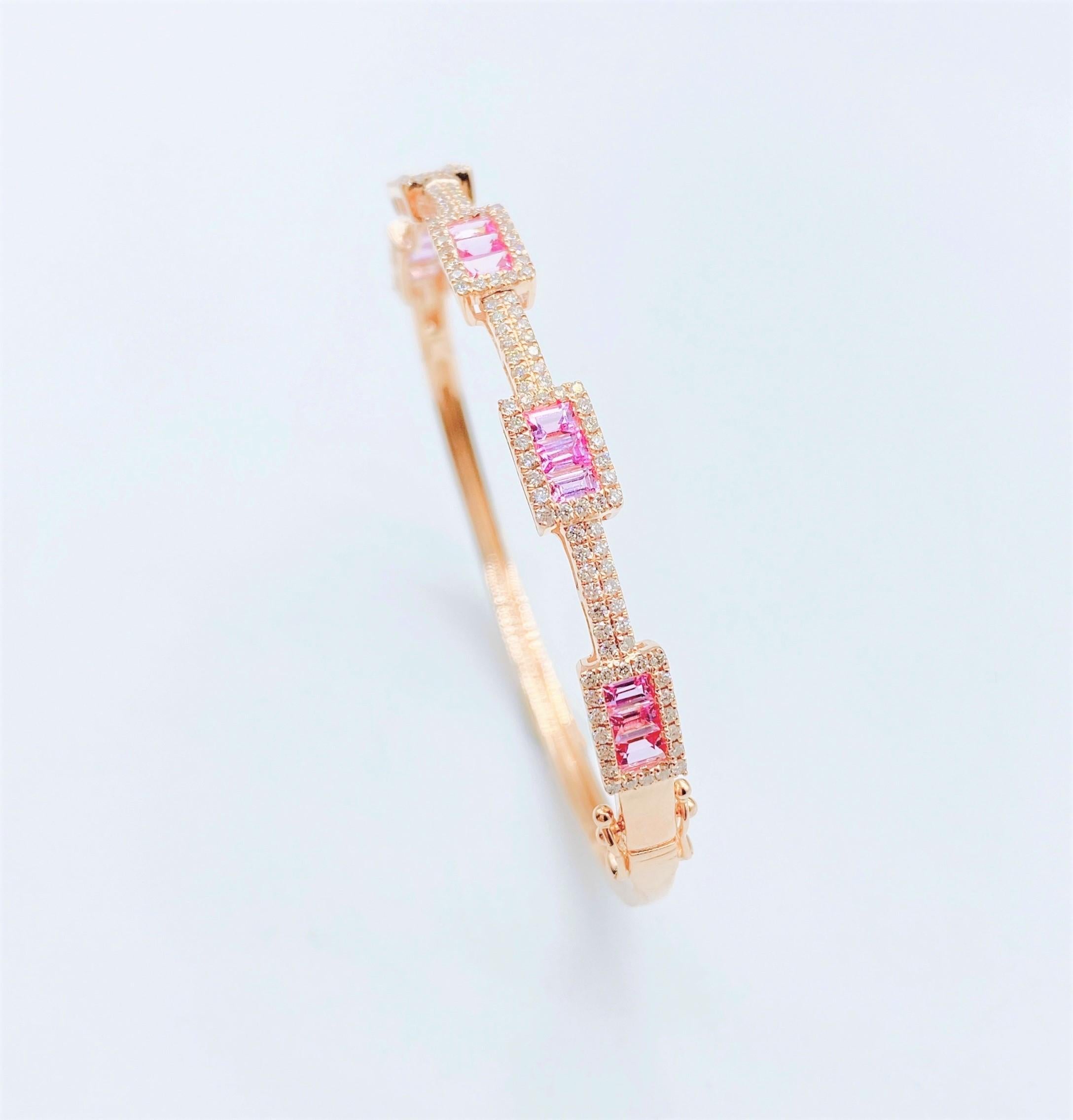 The Following Items we are offering is a Rare Important Radiant  18KT Gold Glistening Magnificent Large Baguette Cut Pink Sapphire and Round Cut Diamond Bracelet. These Gorgeous Pink Sapphires are Glowing and Glittering and the Diamonds are