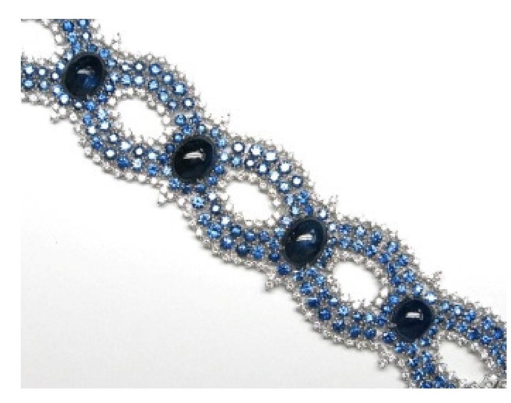 The Following Item we are Offering is this Magnificent 18KT Gold Large Extremely Rare Fancy Large Blue Sapphire Cabochon Fancy Blue Sapphire and Diamond Bracelet. This Gorgeous Bracelet features Large Gorgeous Blue Sapphire Cabochons set in 18KT