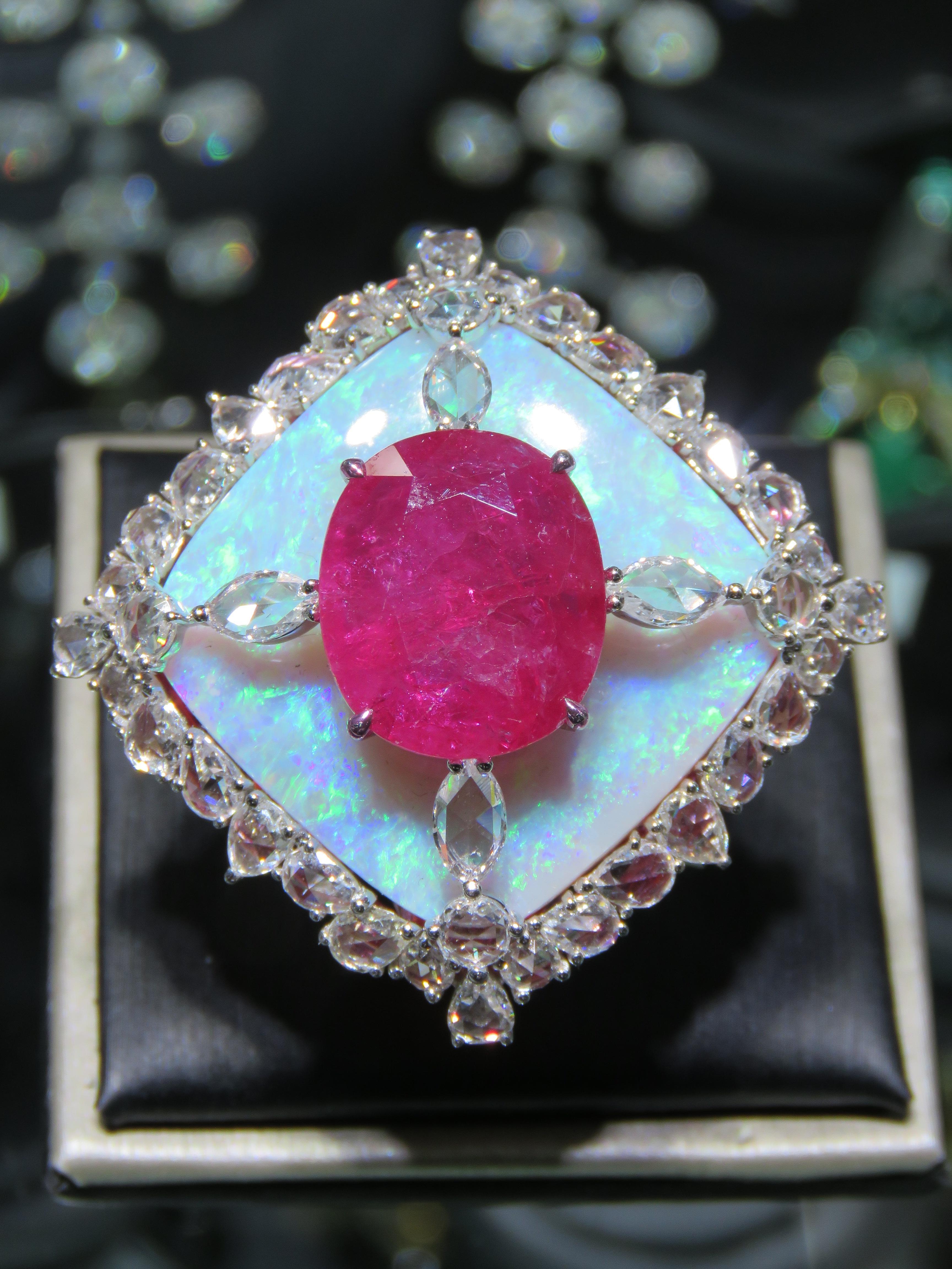 The Following Item we are offering is a Rare Important Radiant 18KT Gold with Large Rare Fancy Gorgeous Large Fancy Ruby, Black Opal and Diamond Ring. Ring is comprised of Magnificent A Rare Large Gorgeous Ruby sitting atop a Large Gorgeous Fancy
