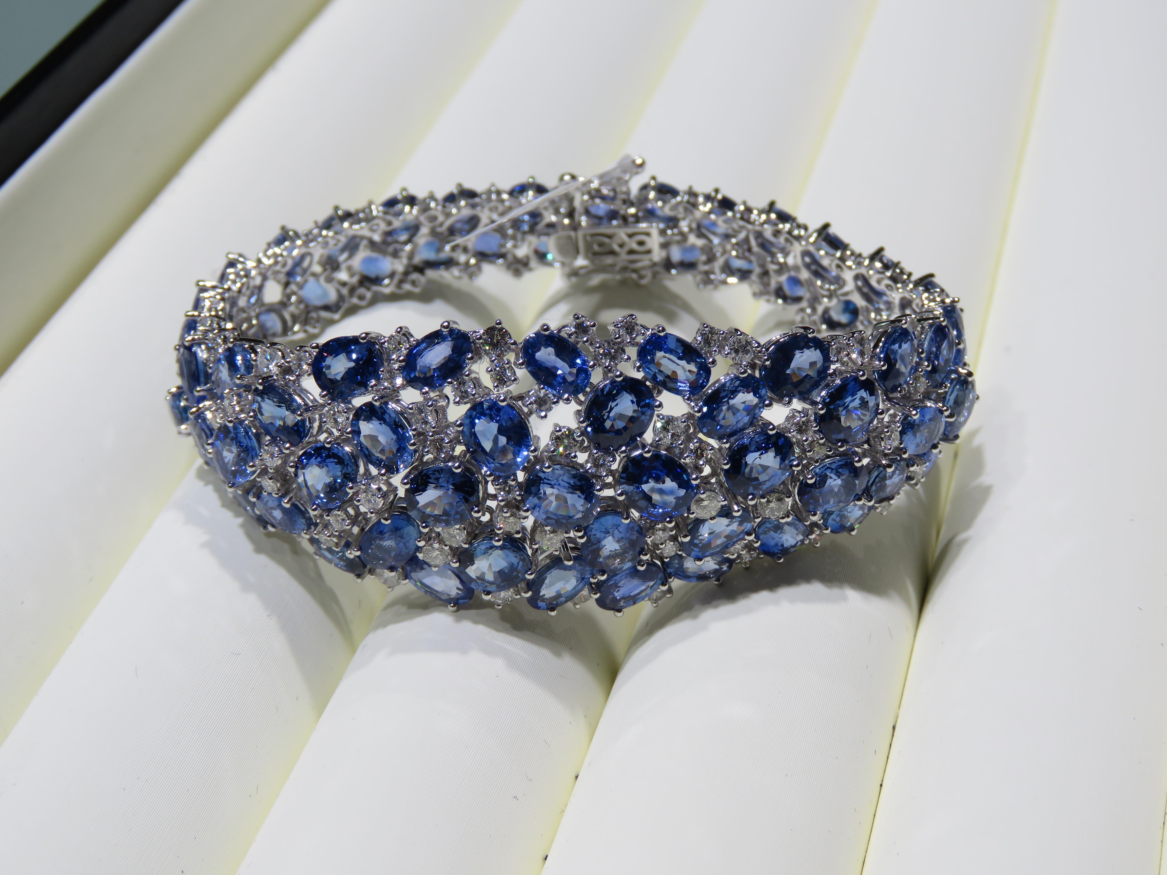 A Rare 18KT White Gold Ceylon Sapphire Diamond Bracelet. Bracelet is comprised of Finely Set Glittering Gorgeous Ceylon Sapphires and adorned with Sparkling Round Diamonds!! T.C.W. approx 50CTS!!! This Gorgeous Bracelet is a Sample Piece from a
